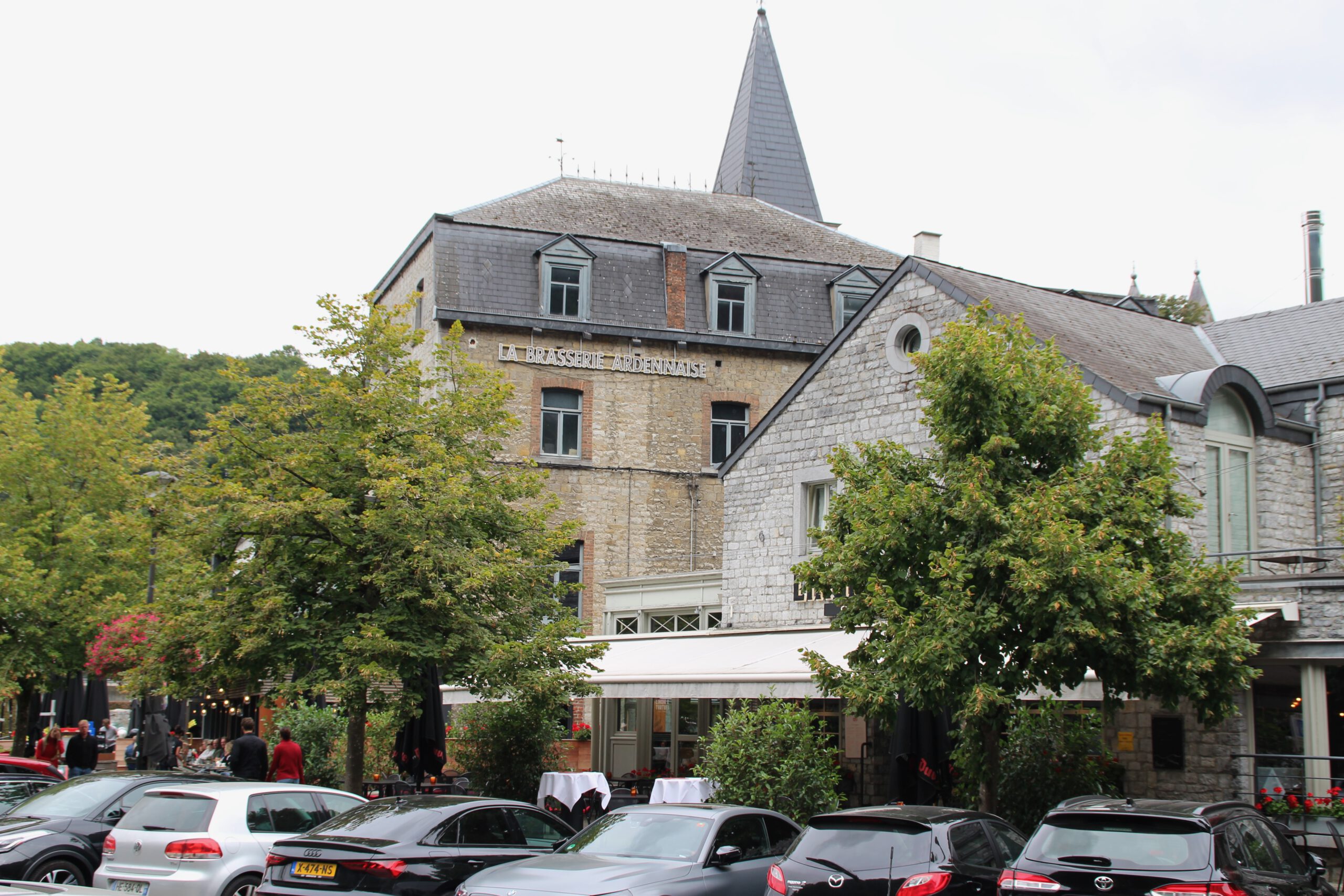 Exterior view of La Brasserie Ardennaise Durbuy, historic restaurant building on Place aux Foires in Durbuy Belgium