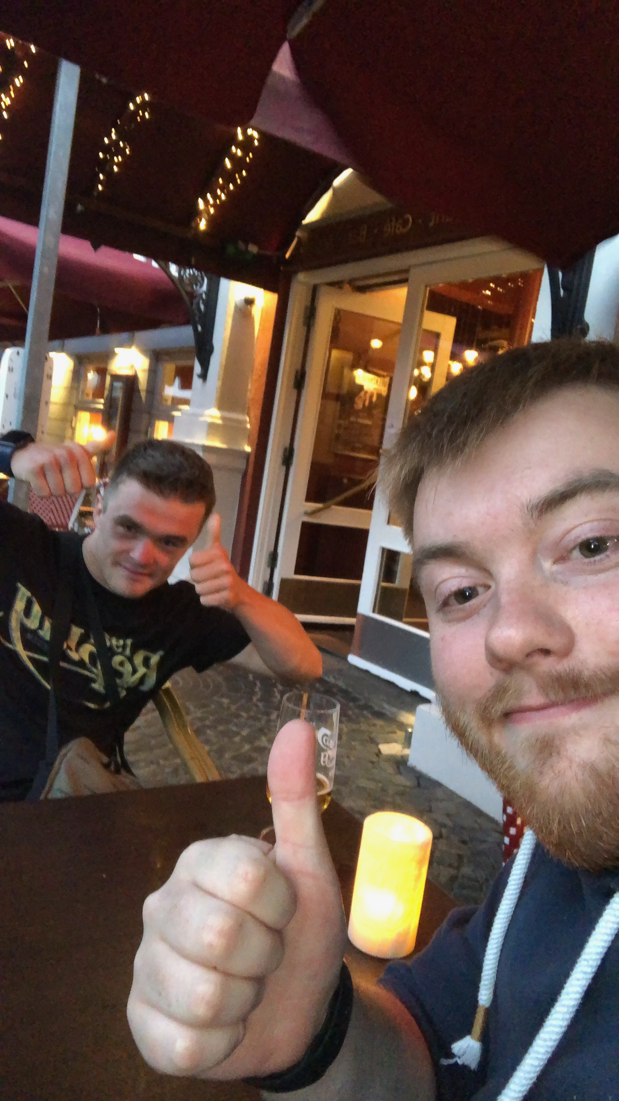 Dronning Louise Esbjerg Review terrace moment in Esbjerg Denmark with two travelers enjoying drinks outside in the evening