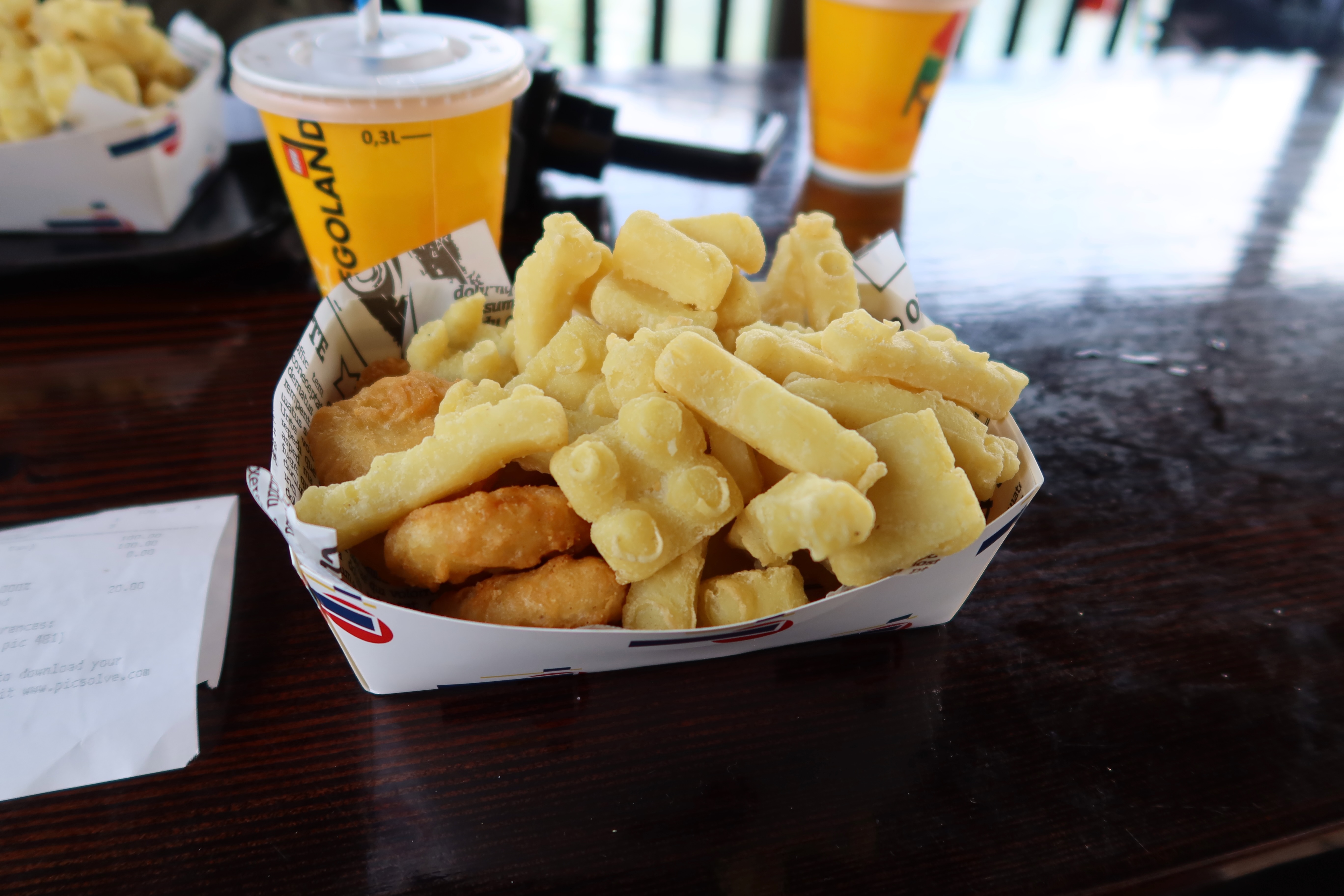 LEGOLAND Billund review IMG 2793 showing LEGO shaped fries with chicken nuggets and drinks served inside LEGOLAND Billund Denmark