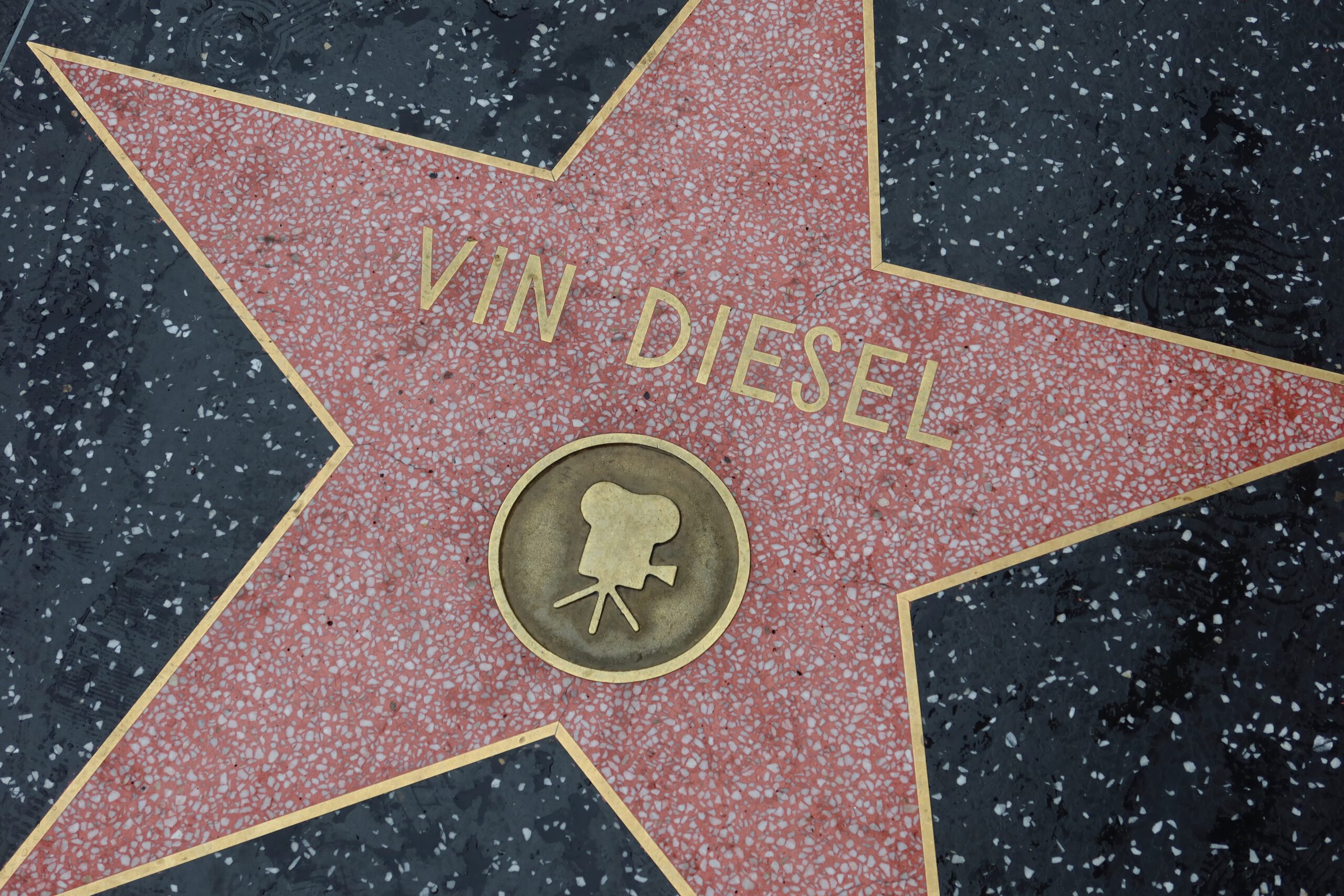 Close-up of Vin Diesel’s Hollywood Walk of Fame star on Hollywood Boulevard, showing the film camera icon and terrazzo details.