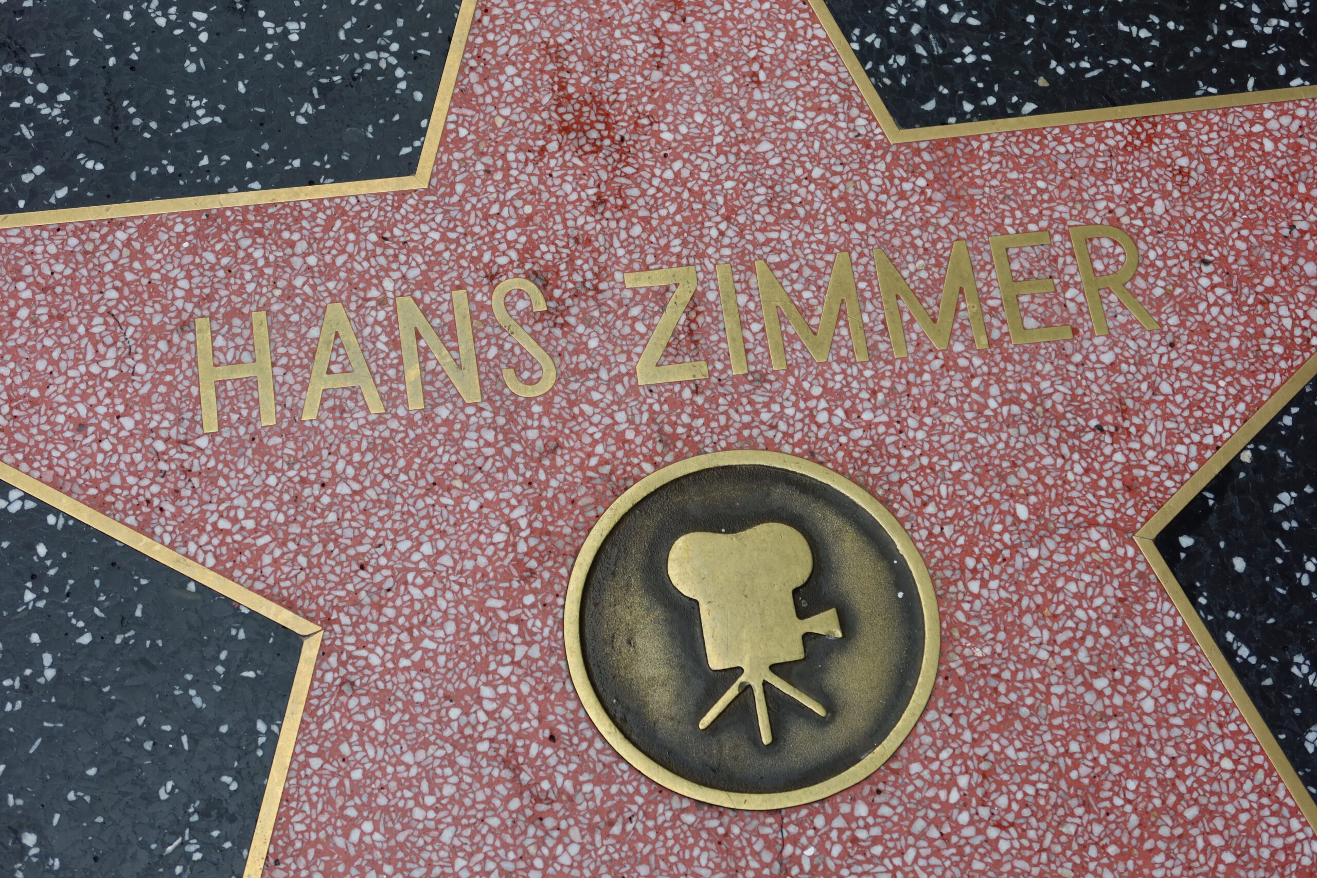 Hans Zimmer’s star on the Hollywood Walk of Fame in Los Angeles, honoring the famous film composer along Hollywood Boulevard.