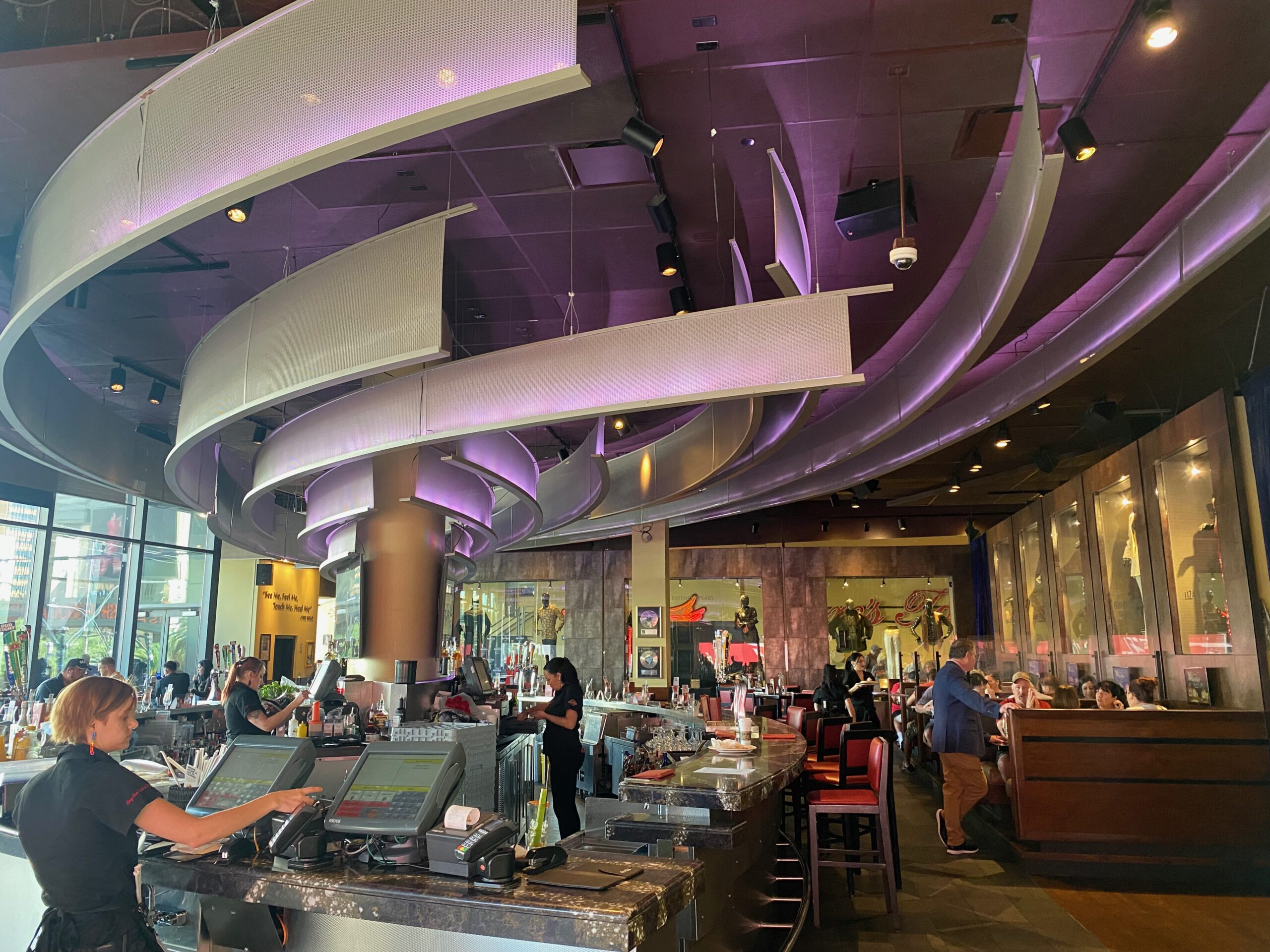 Interior view of Hard Rock Cafe Las Vegas Strip showing the central bar, dining area, and modern rock-inspired design.