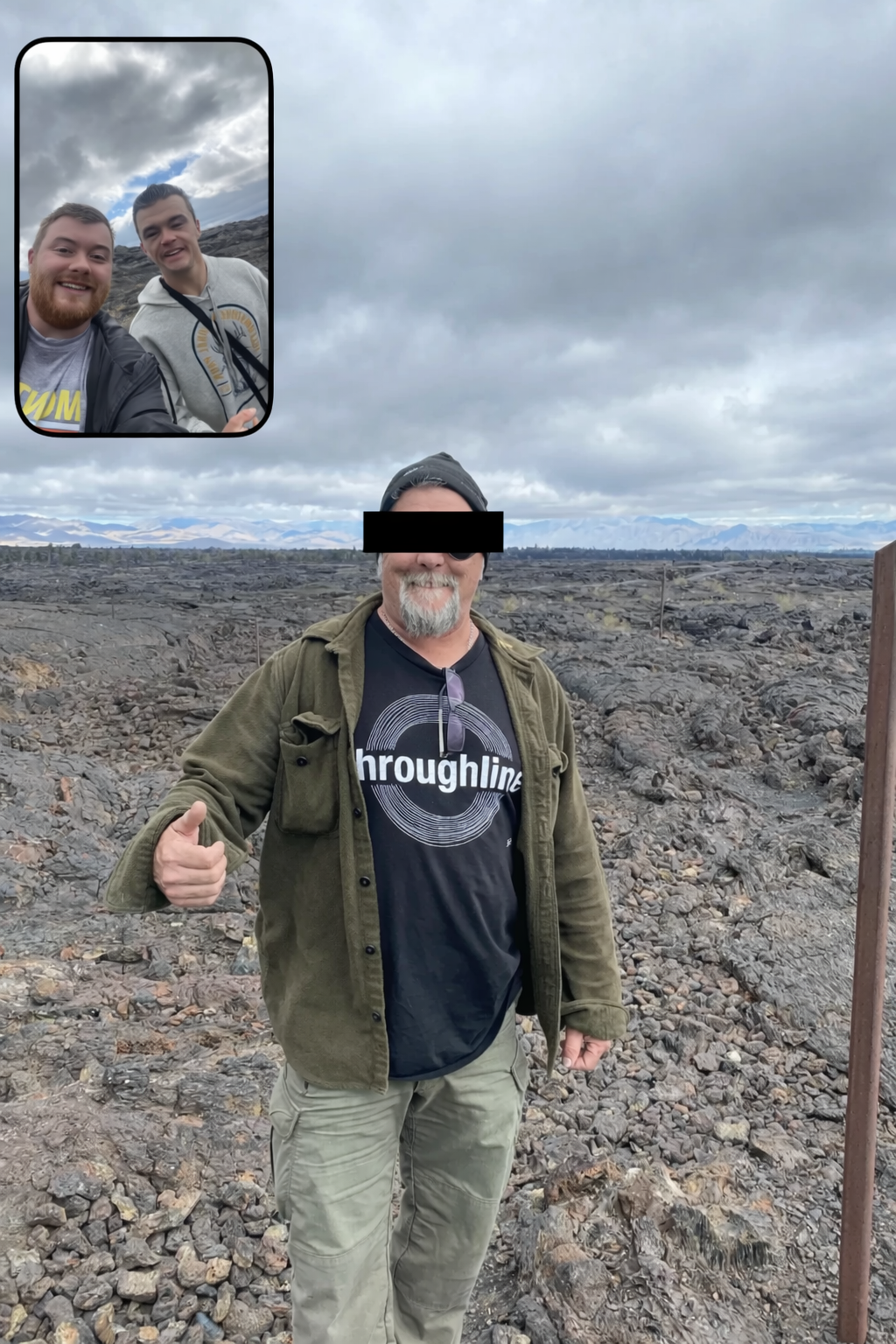 Local guide John standing on volcanic lava fields at Craters of the Moon National Monument near the Indian Tunnel trail, Idaho