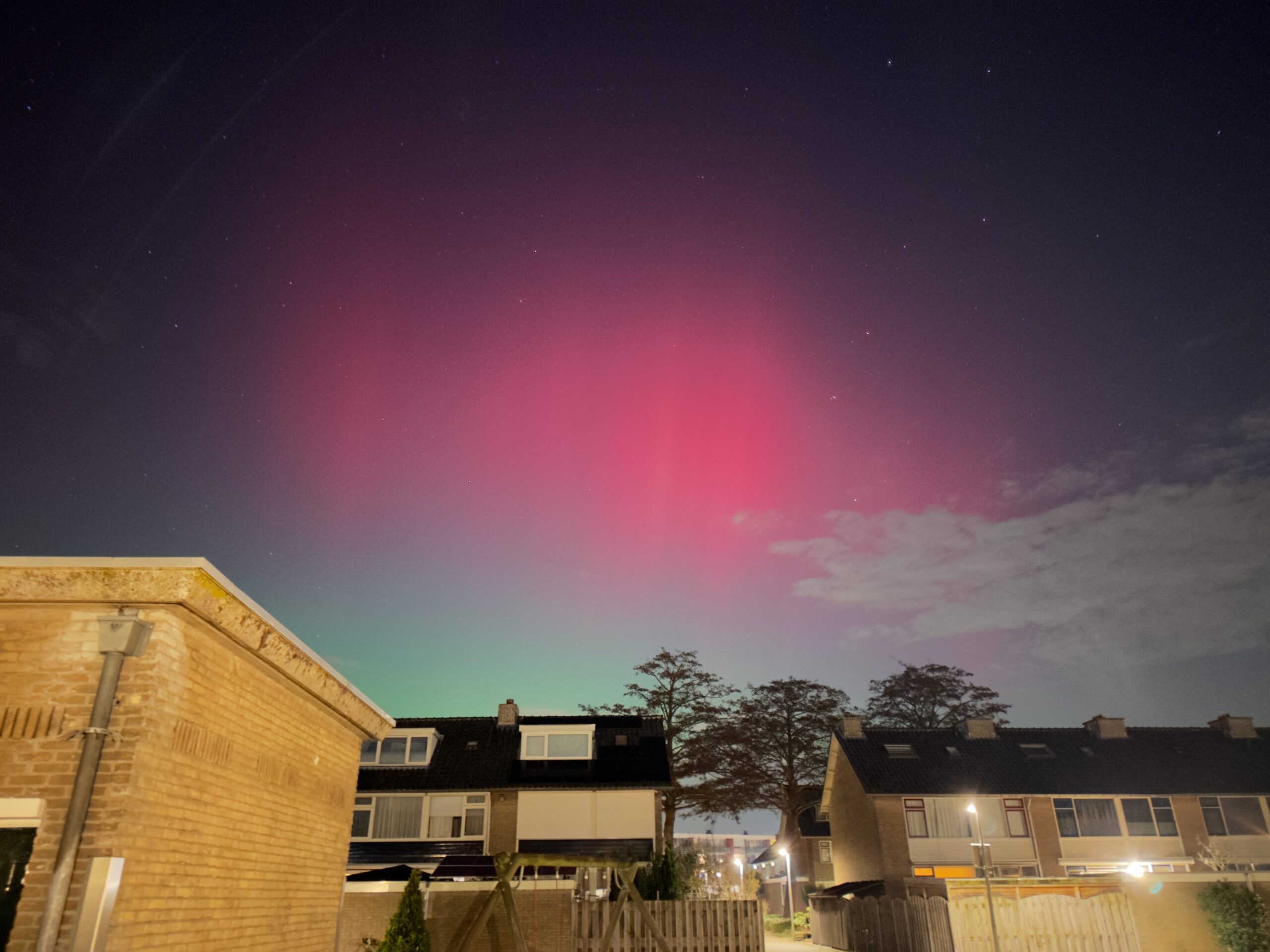 Northern Lights Netherlands January 2026 with red and green aurora borealis visible above Waddinxveen, captured on January 19, 2026