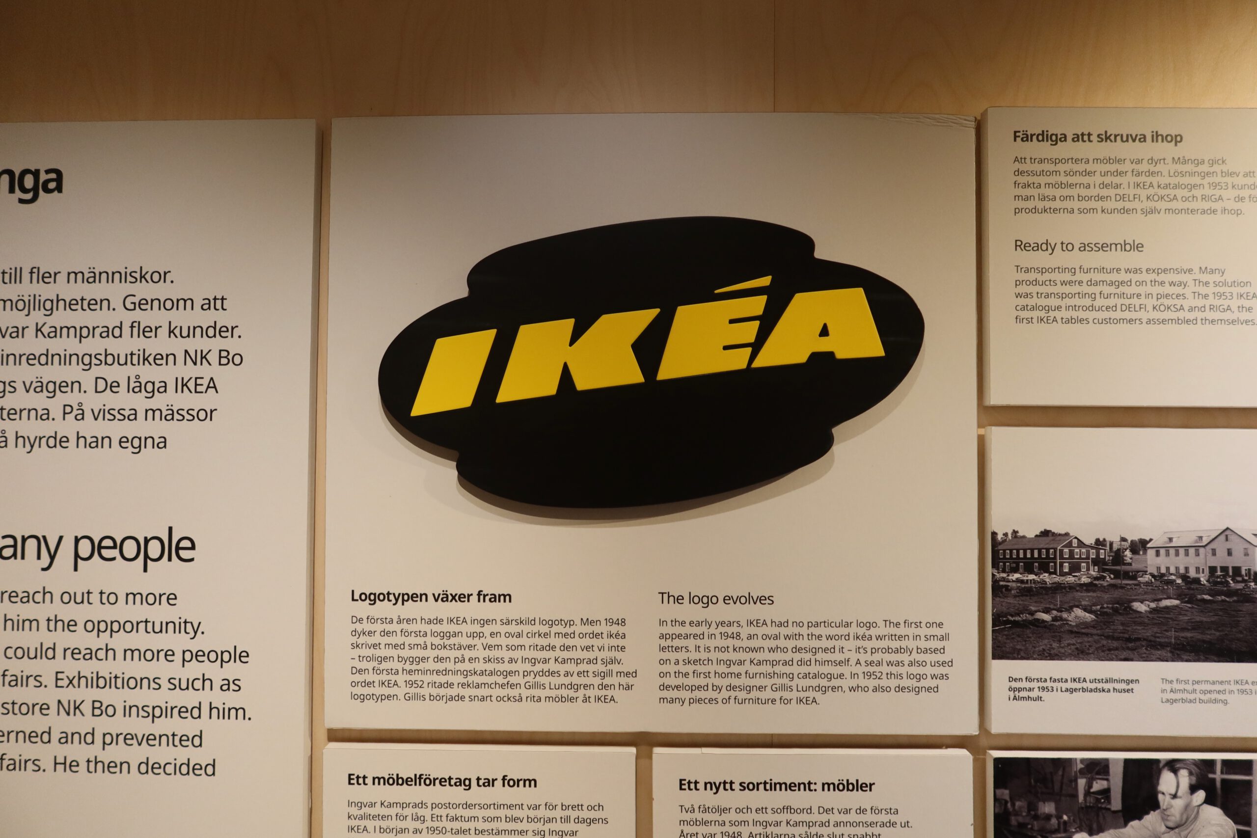 IKEA Museum Älmhult interior, historic IKEA logo display explaining the evolution of IKEA design and branding