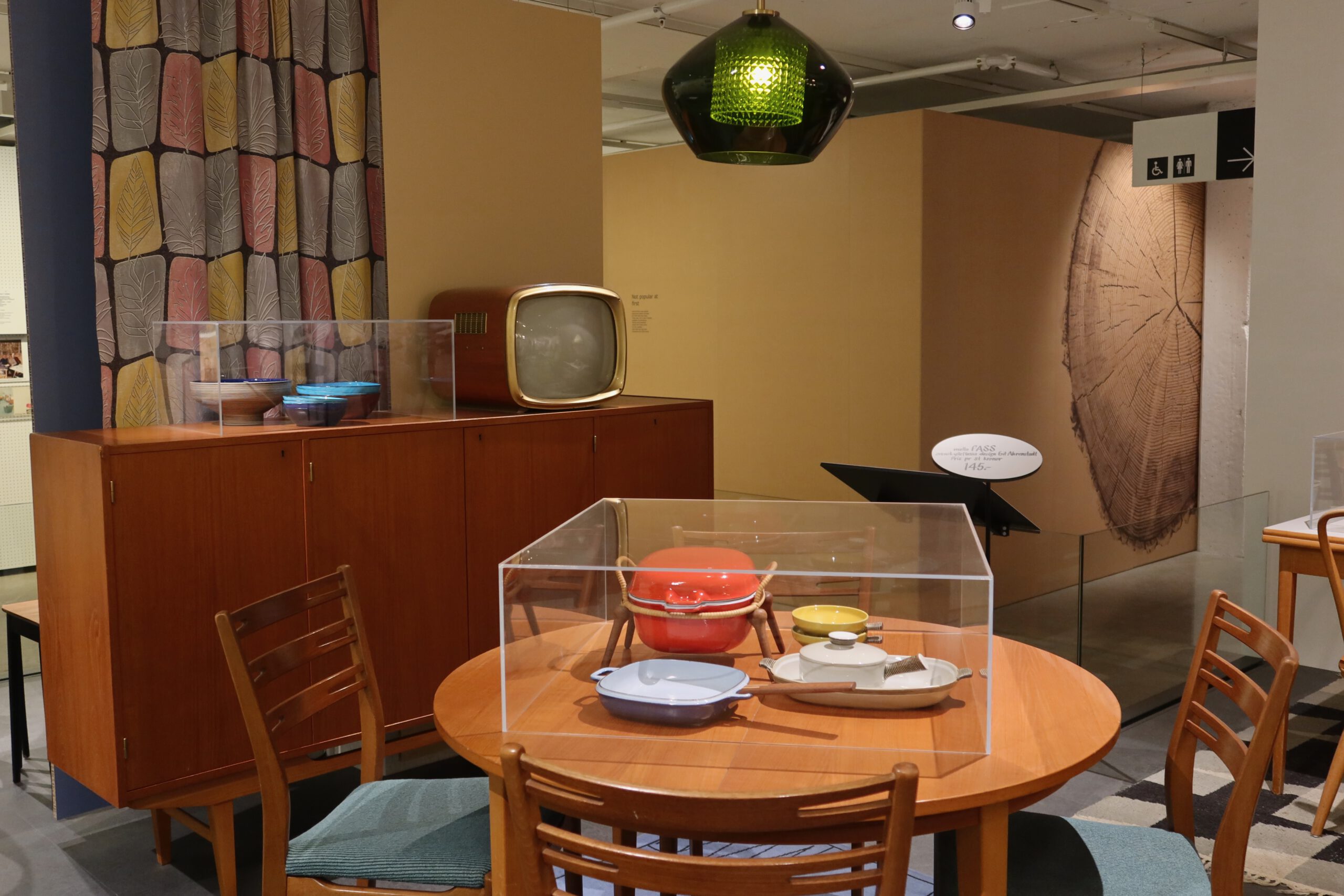 IKEA Museum Älmhult interior, vintage dining room display with classic IKEA furniture and retro tableware