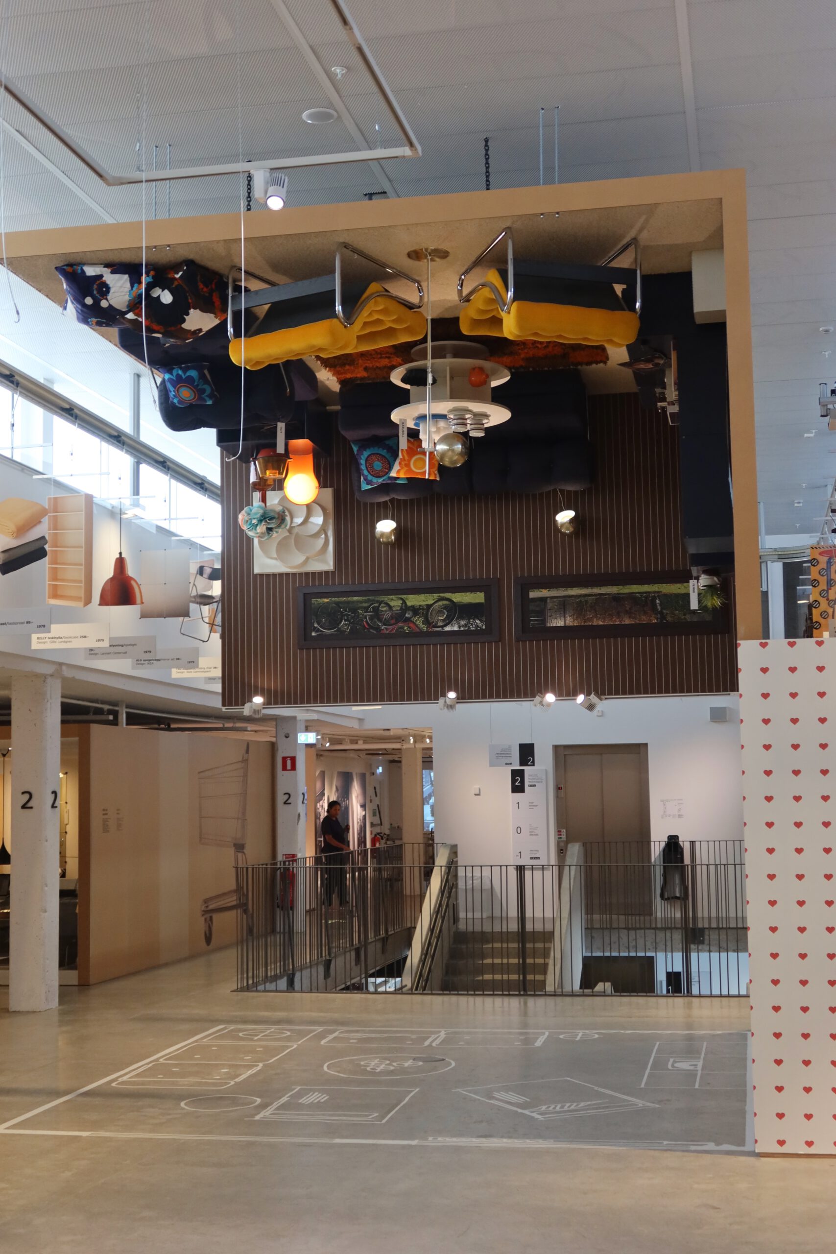 IKEA Museum Älmhult interior, creative upside down living room installation highlighting innovative IKEA design concepts