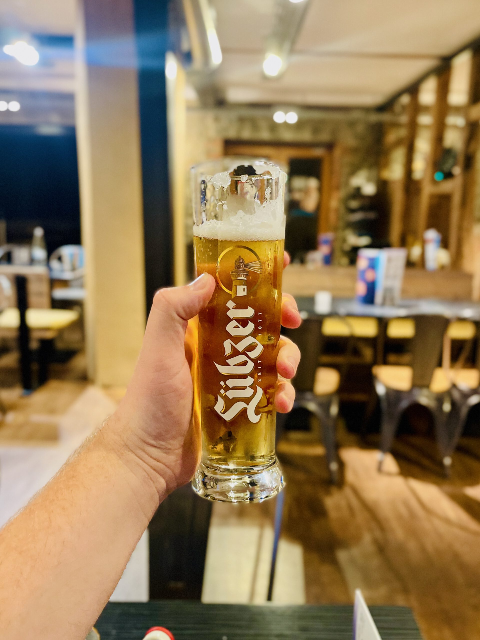 Lachs Räucherei Wortberg Sakura Sushi Wuppertal Riegele beer served in a tall glass inside the seafood restaurant