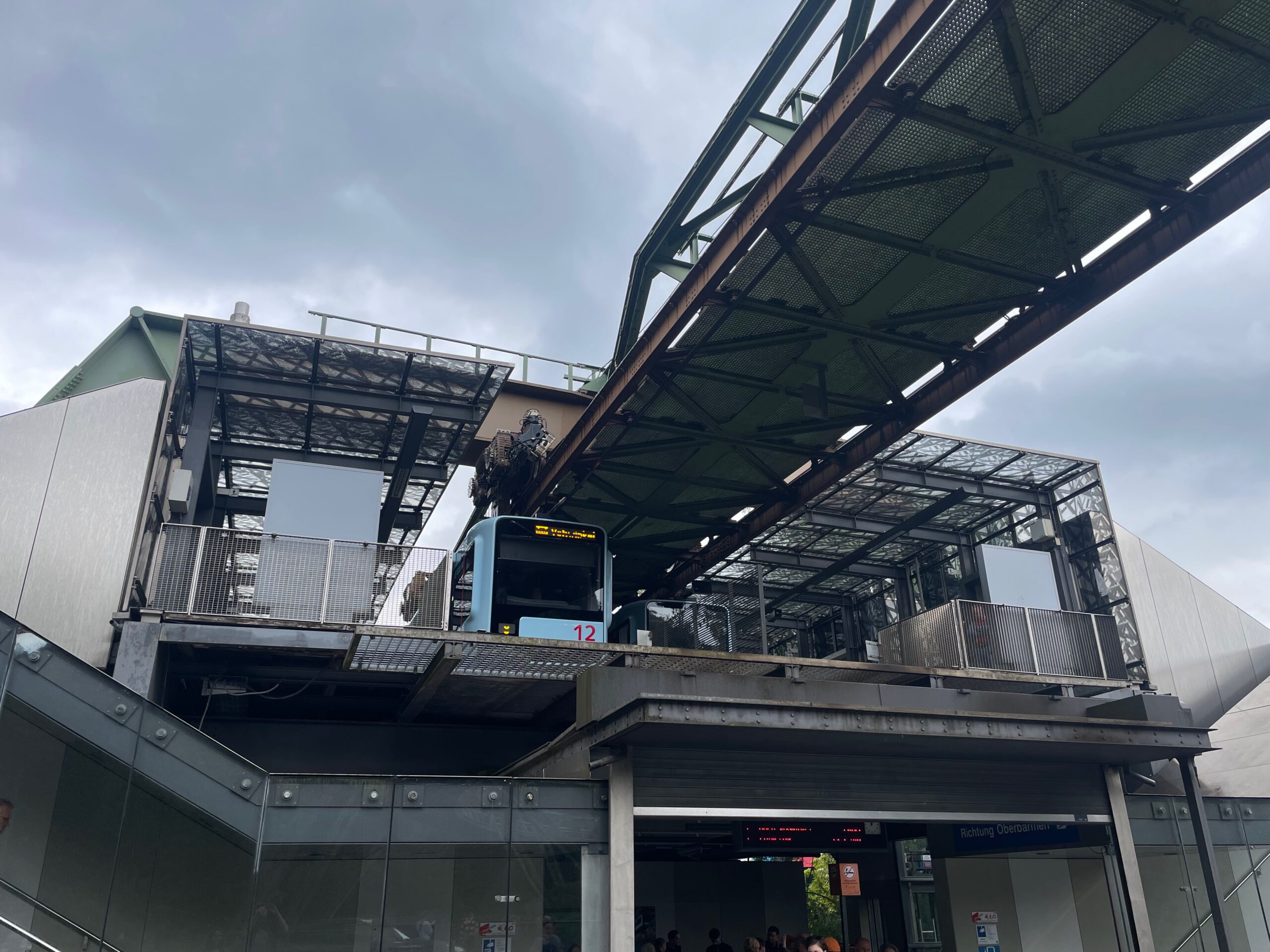 Schwebebahn Wuppertal train stopped at station during service disruption above the city
