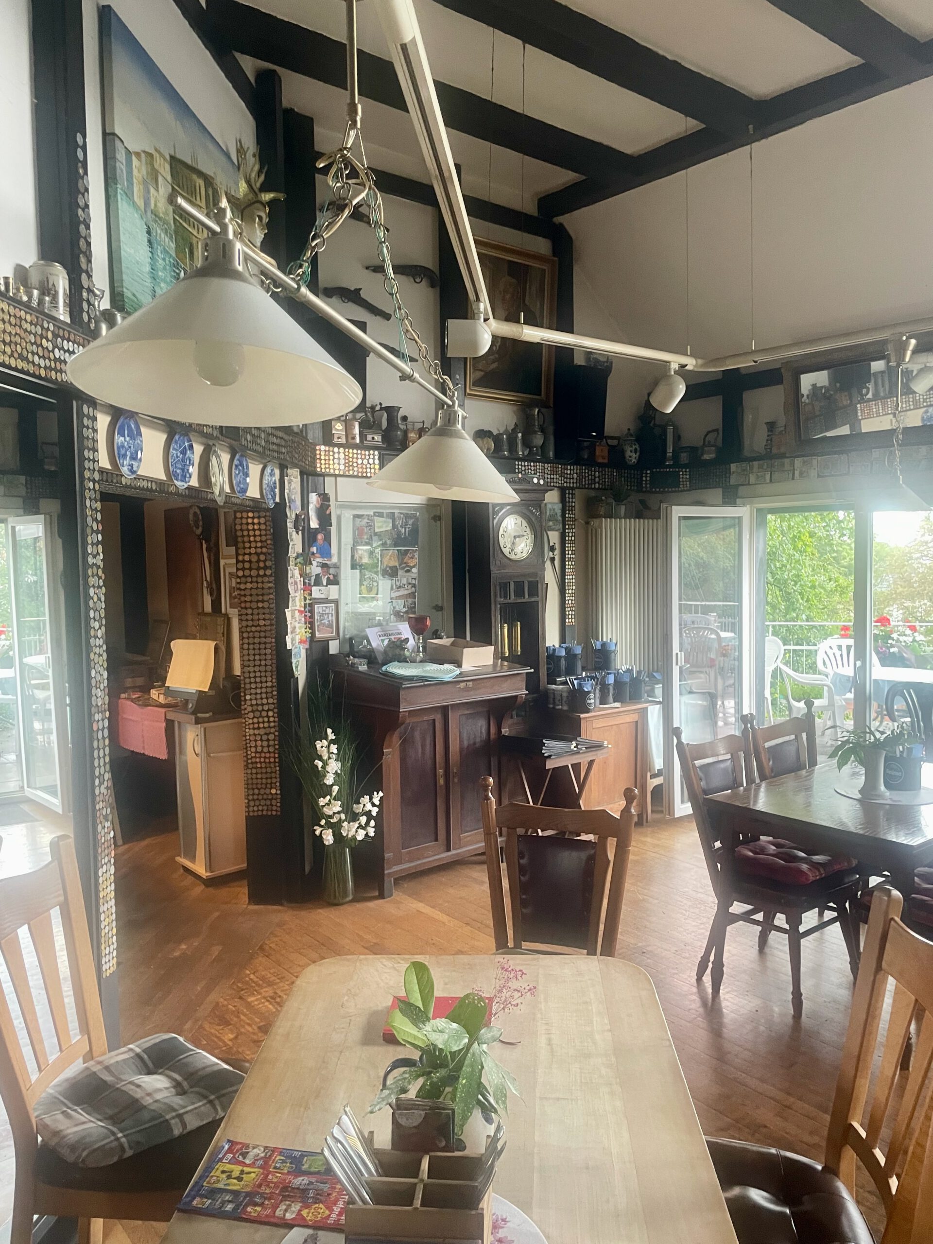 Kaffee Restaurant Hardt Stübchen Wuppertal interior with cozy wooden tables, traditional German décor, and warm old-fashioned atmosphere