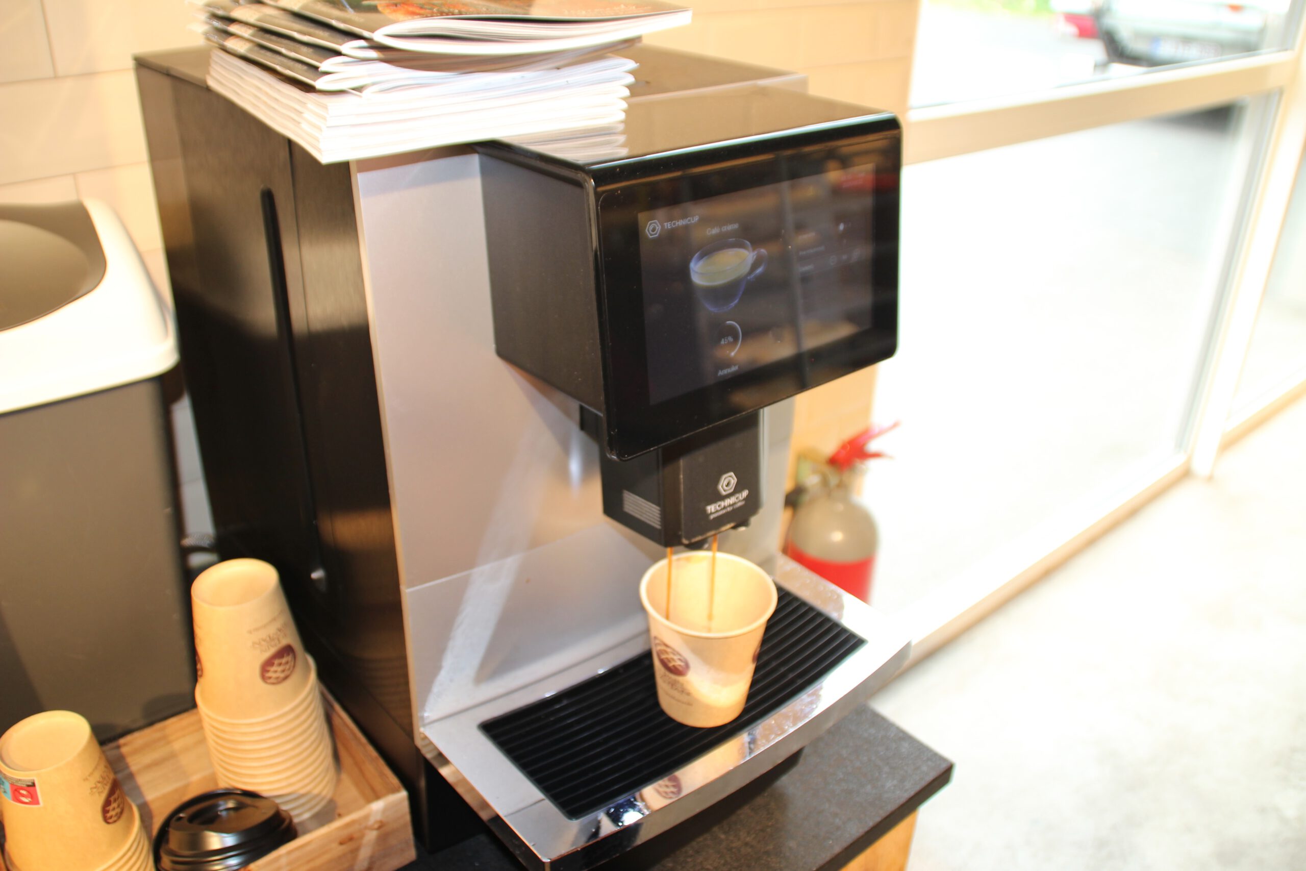 Le Pain d’Antan Remouchamps free coffee machine inside the bakery, complimentary coffee included with breakfast purchase