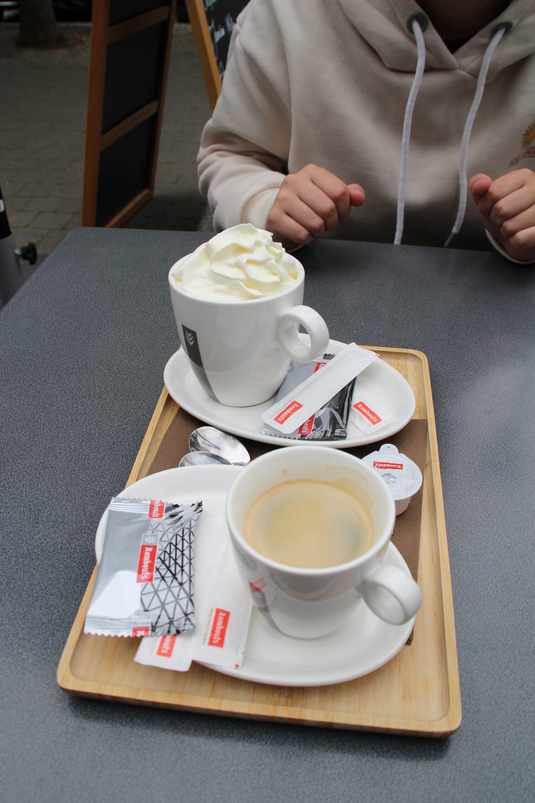 Coffee at La Brasserie Ardennaise Durbuy, espresso and cappuccino served on the terrace in the historic center of Durbuy