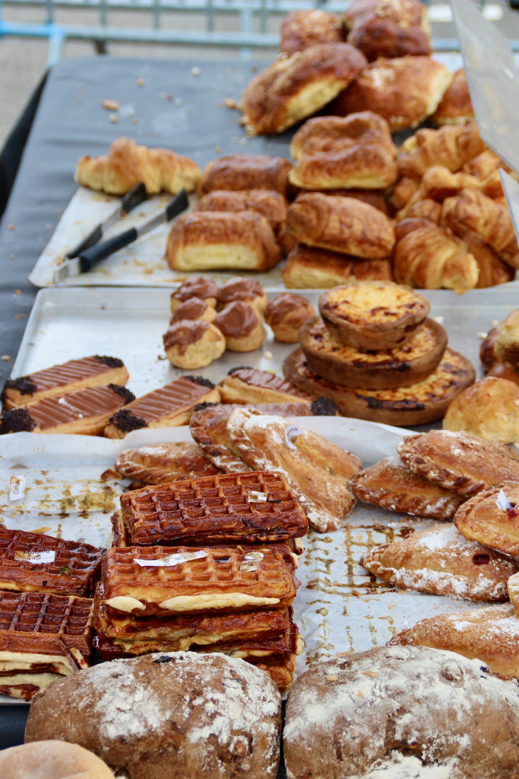 Josephine Caravan Aywaille local bakery stall at the Aywaille weekly market offering fresh pastries and bread, supporting local producers