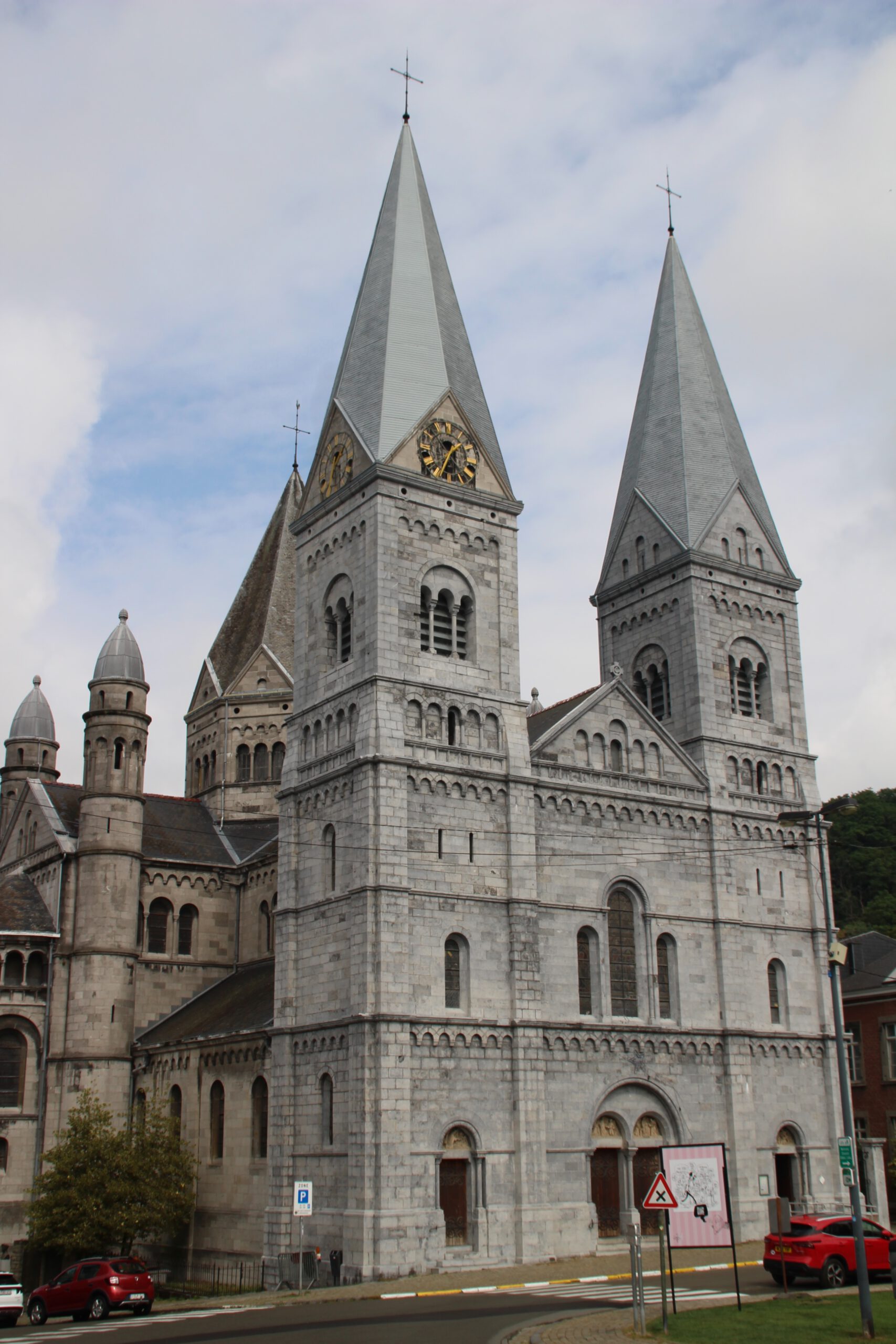 Saint Remaclus Church in Spa front view, Neo Romanesque facade with twin towers in the historic city center of Spa, Belgium