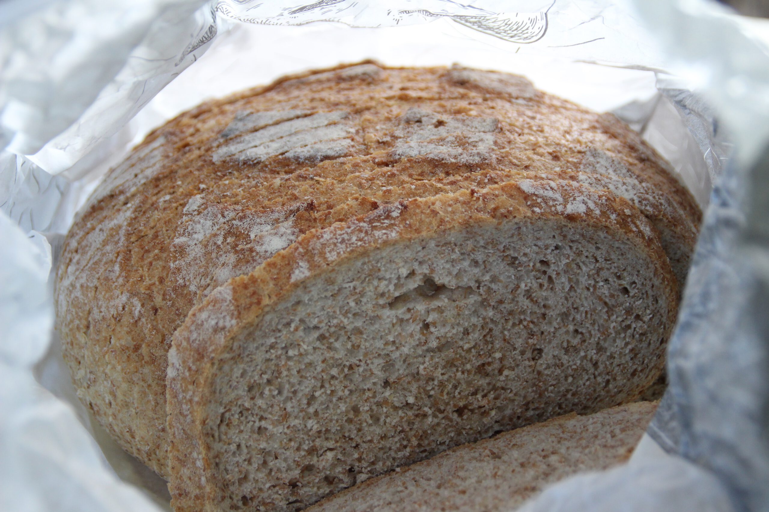 Josephine Caravan Aywaille freshly baked local bread from the Aywaille weekly market, perfect for a slow breakfast in the Ardennes