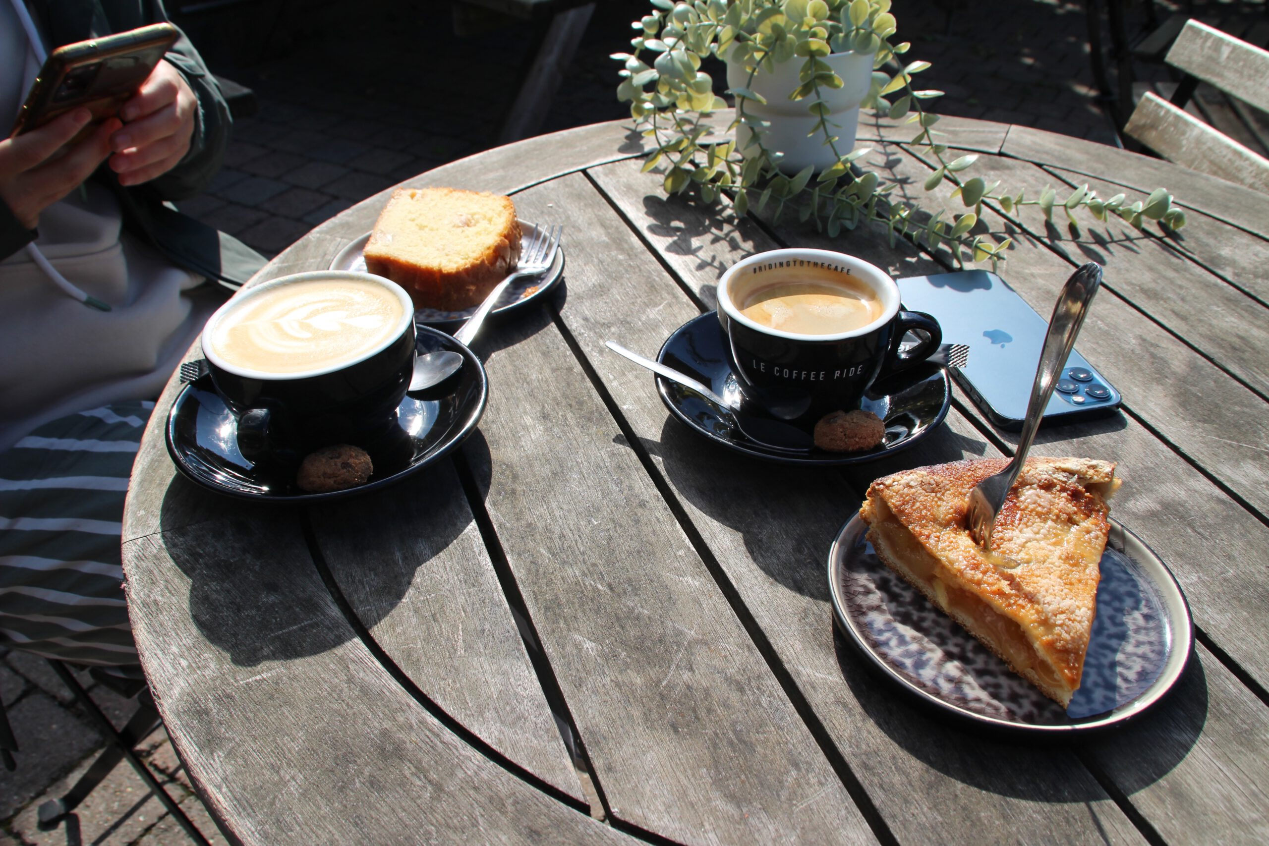 Le Coffee Ride coffee and cake on the terrace in the Belgian Ardennes, cappuccino and espresso with fresh pastry at the cycling café in Stavelot