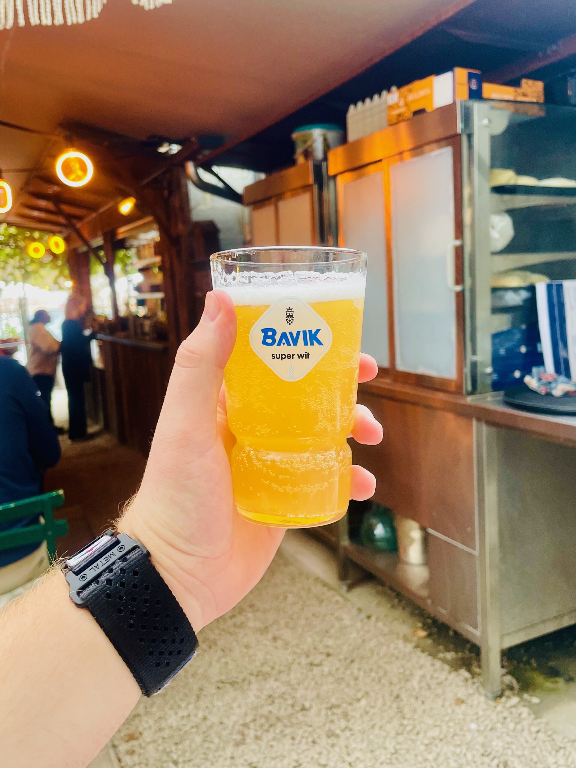 Durbuy travel experience enjoying a cold Bavik Super Wit beer at a relaxed terrace in the heart of Durbuy