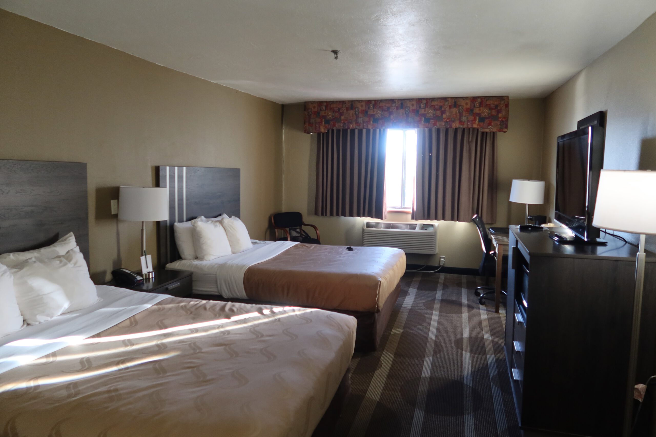 Spacious double queen hotel room at Quality Inn Kanab National Park Area with comfortable beds and modern amenities