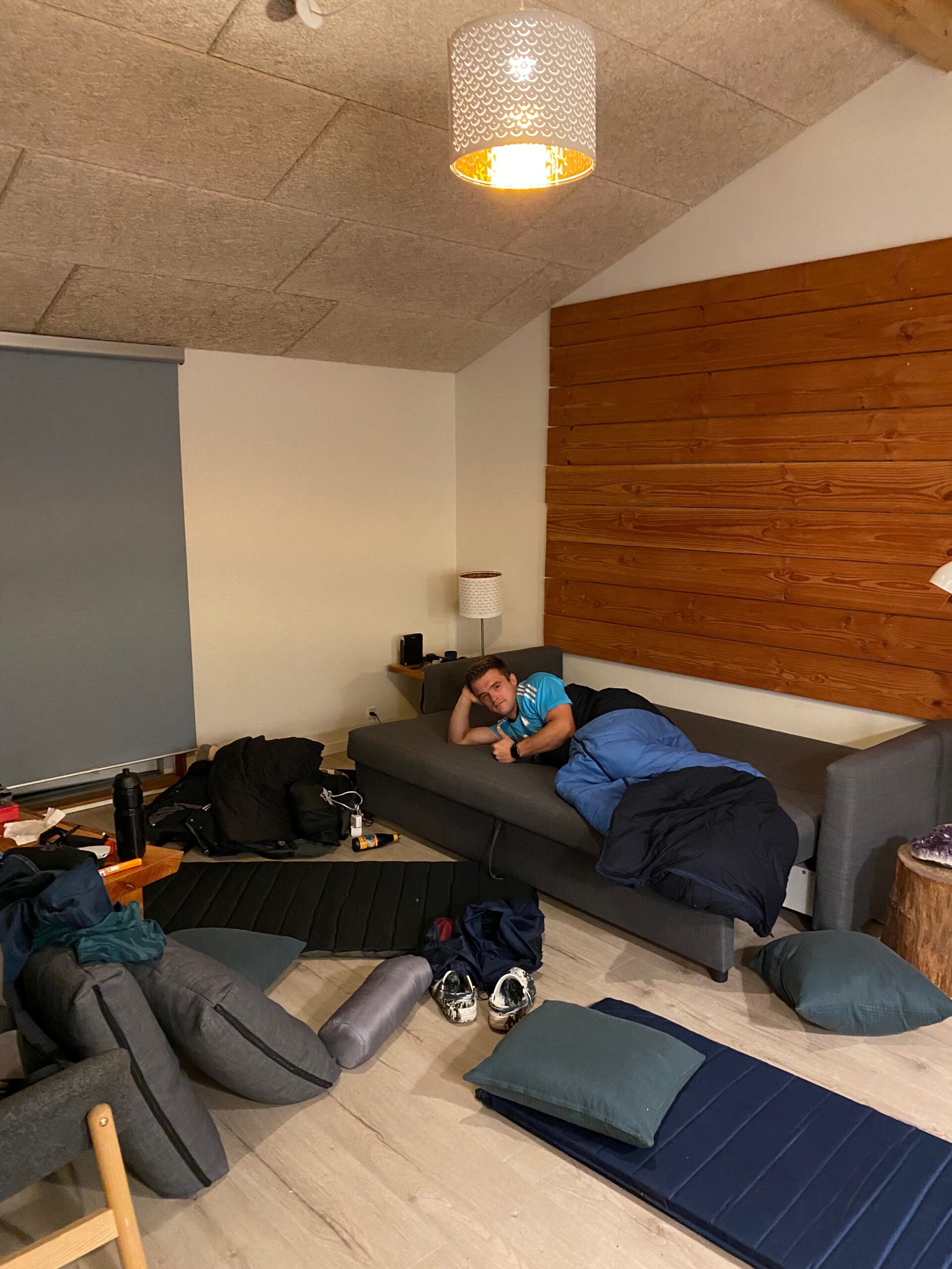 Solevad Cottage in the Forest, indoor sleeping setup with sofa bed and camping mattresses inside the tiny house near Odense