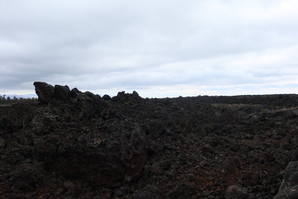 Jagged basalt lava formations formed by ancient volcanic eruptions at Craters of the Moon National Monument in Idaho