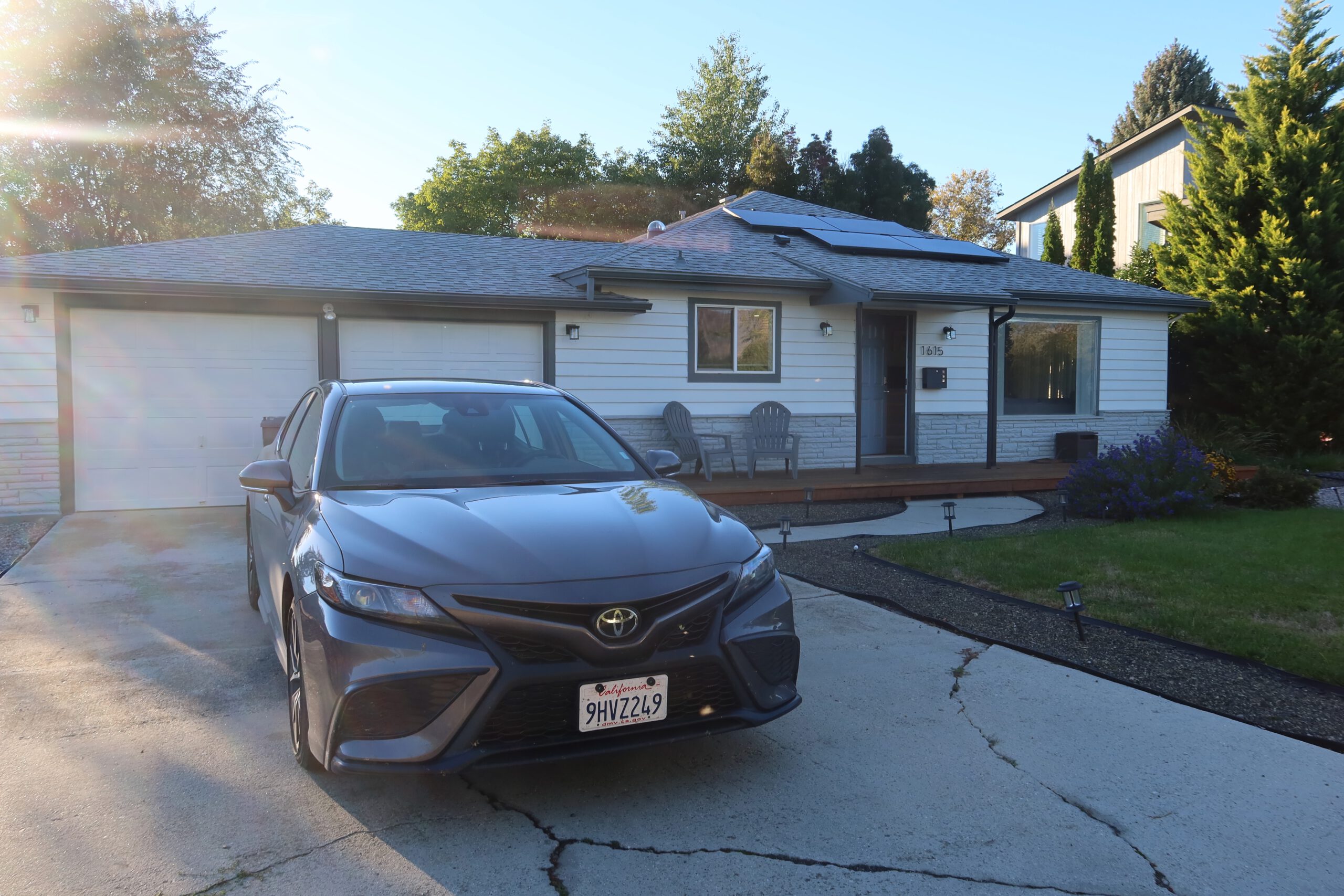Airbnb Boise exterior with private driveway, parking space and renovated home near downtown