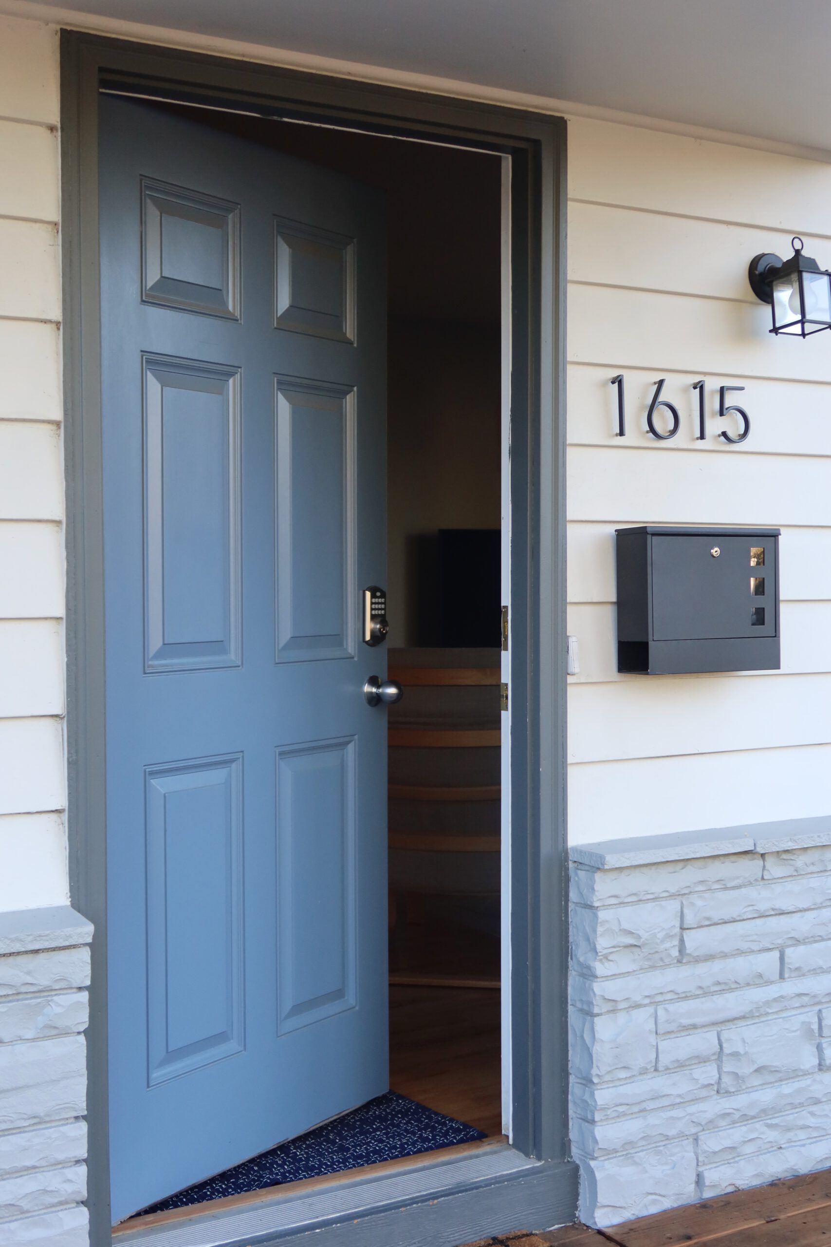 Airbnb Boise front door with keypad entry and private porch entrance