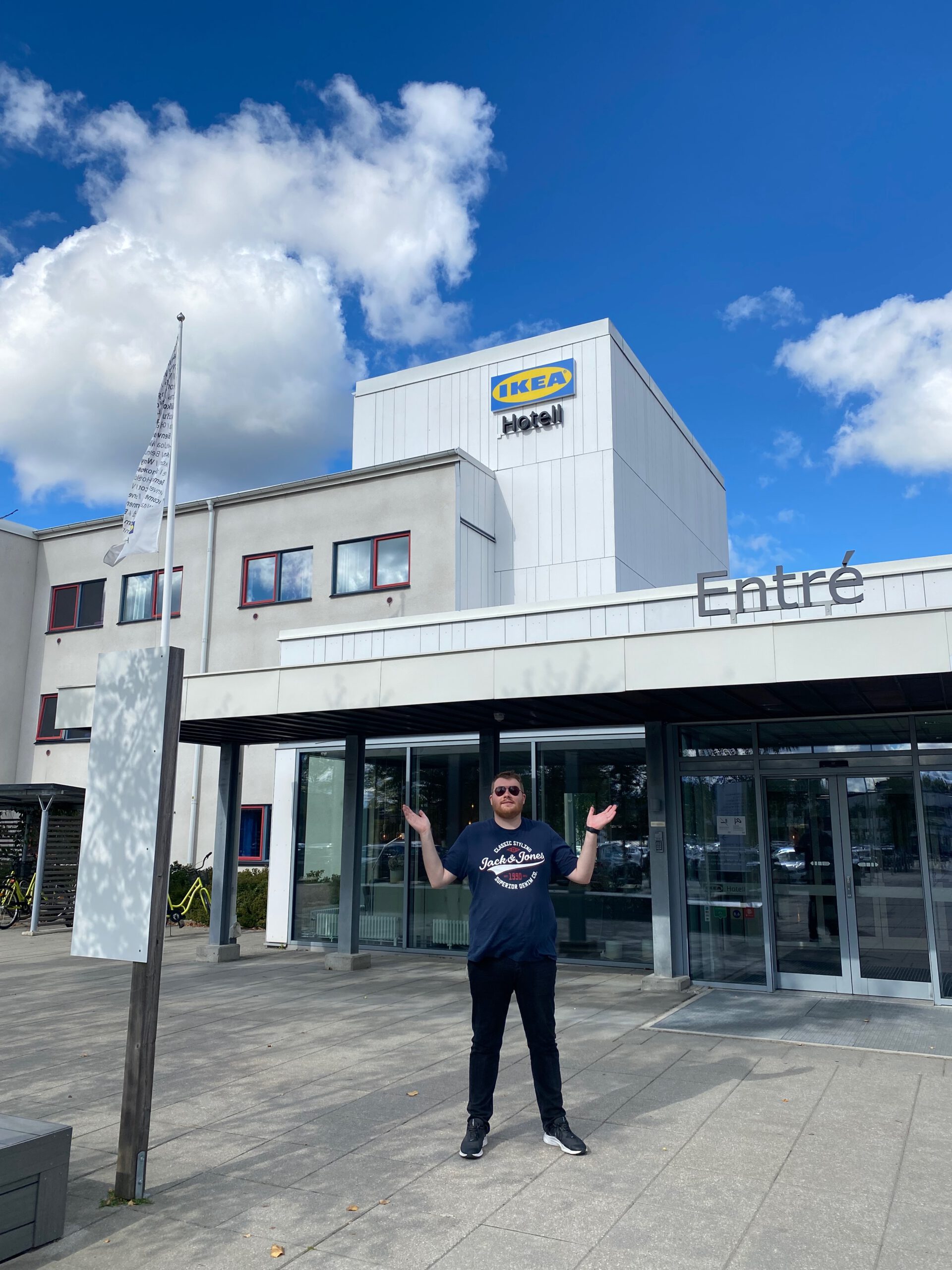 IKEA Hotell Älmhult entrance with Timo van den Berg standing in front of the hotel building in Sweden