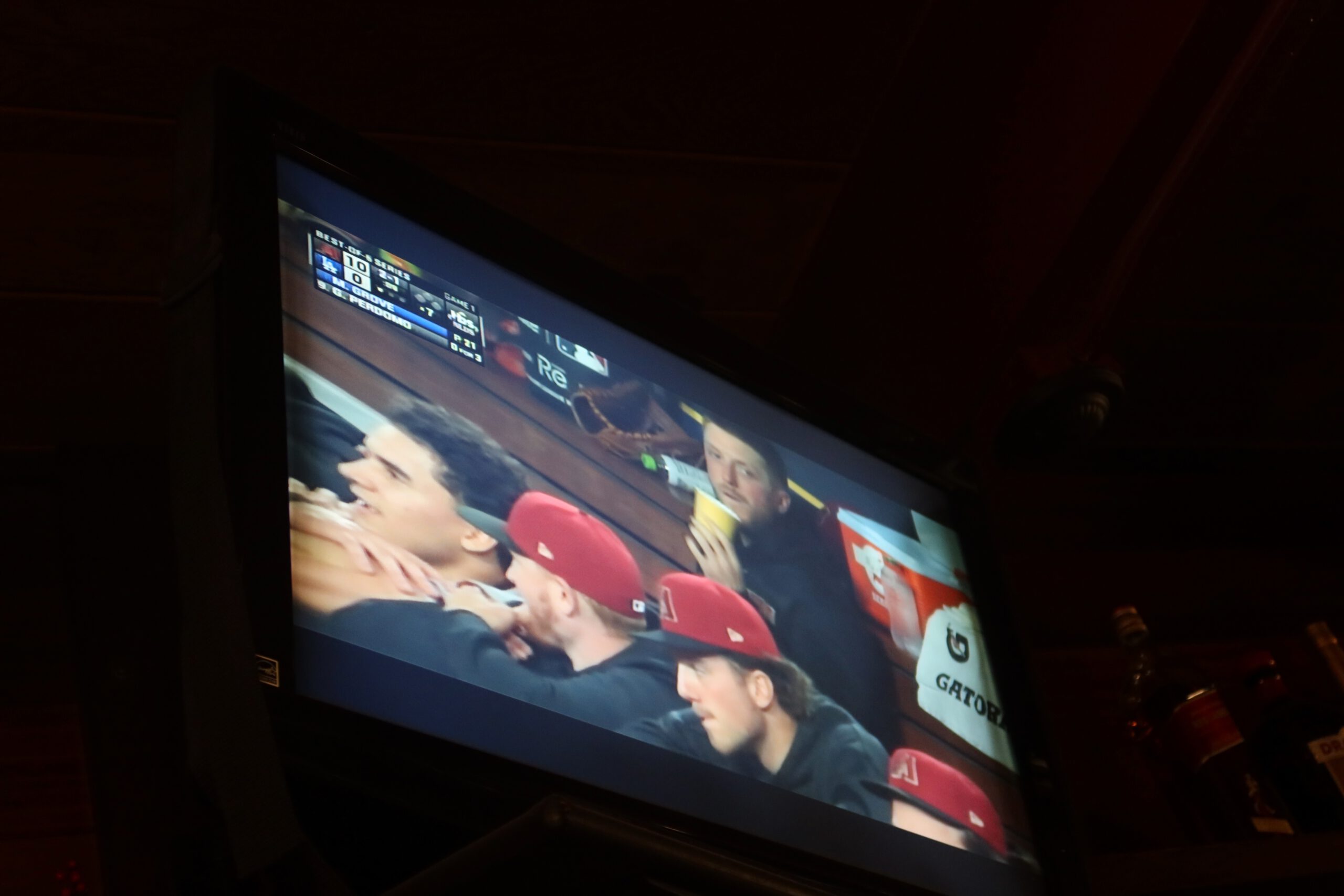 Going out in Lake Tahoe at a local Kings Beach bar with American sports on TV, creating a relaxed pub atmosphere where locals watch games and enjoy drinks