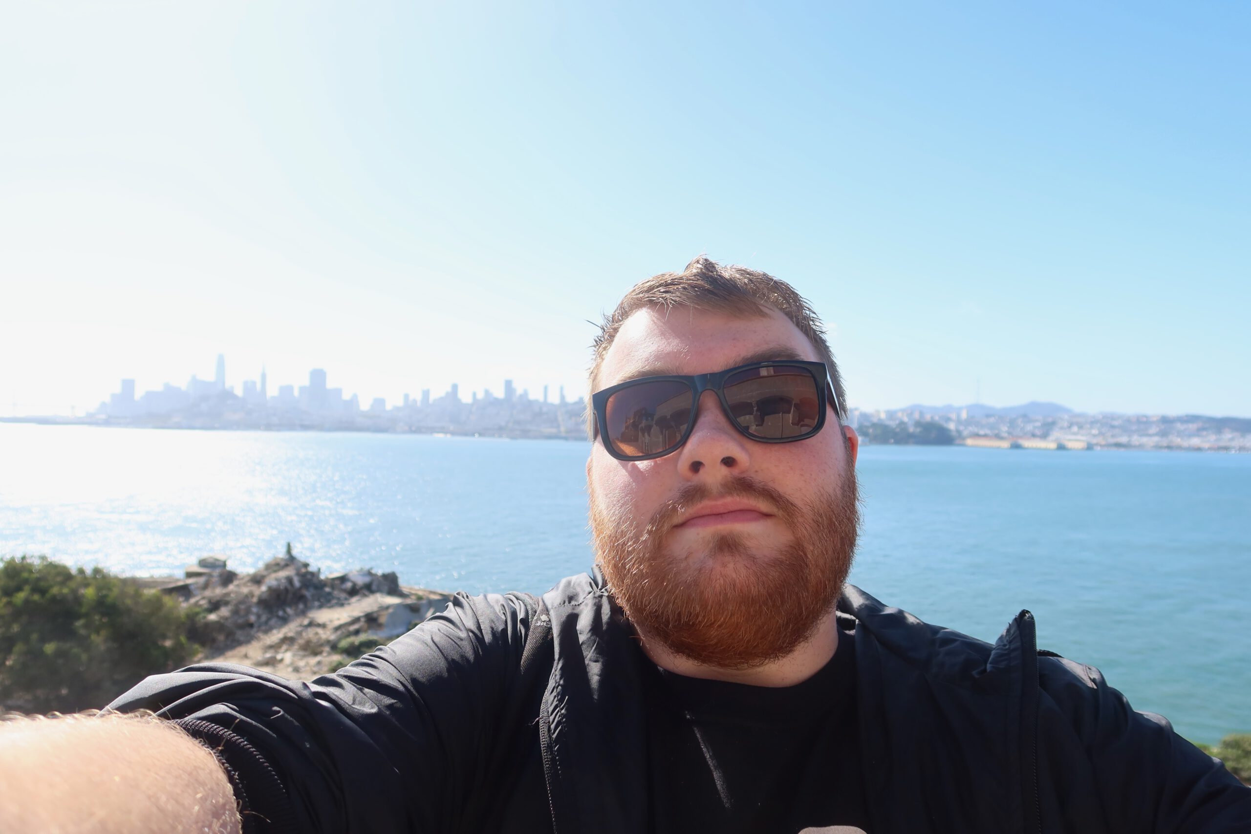 View from Alcatraz Island overlooking San Francisco Bay with Timo van den Berg (Timeuw) in the foreground and the San Francisco skyline in the background