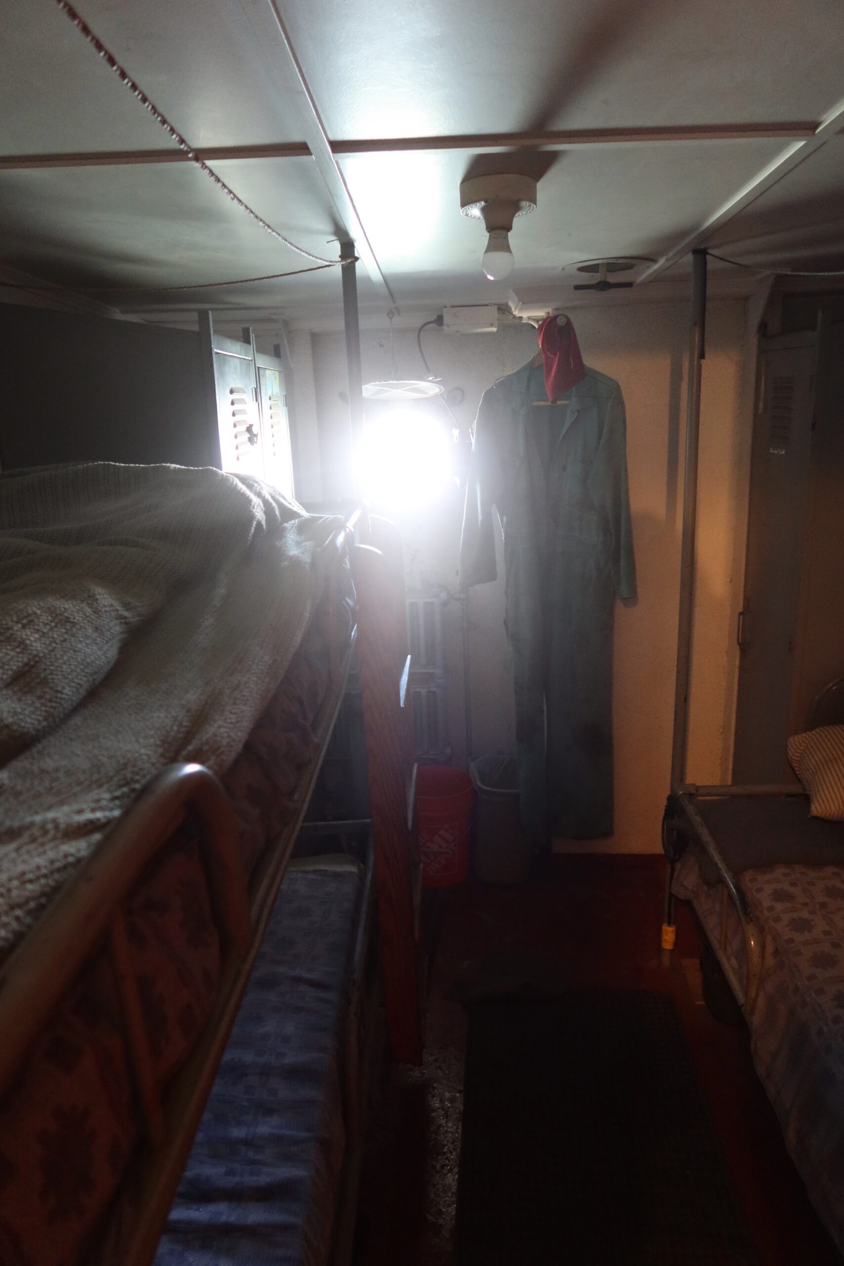 SS Jeremiah O'Brien interior view of authentic World War II sailor bunks with personal space and lighting inside the historic Liberty ship