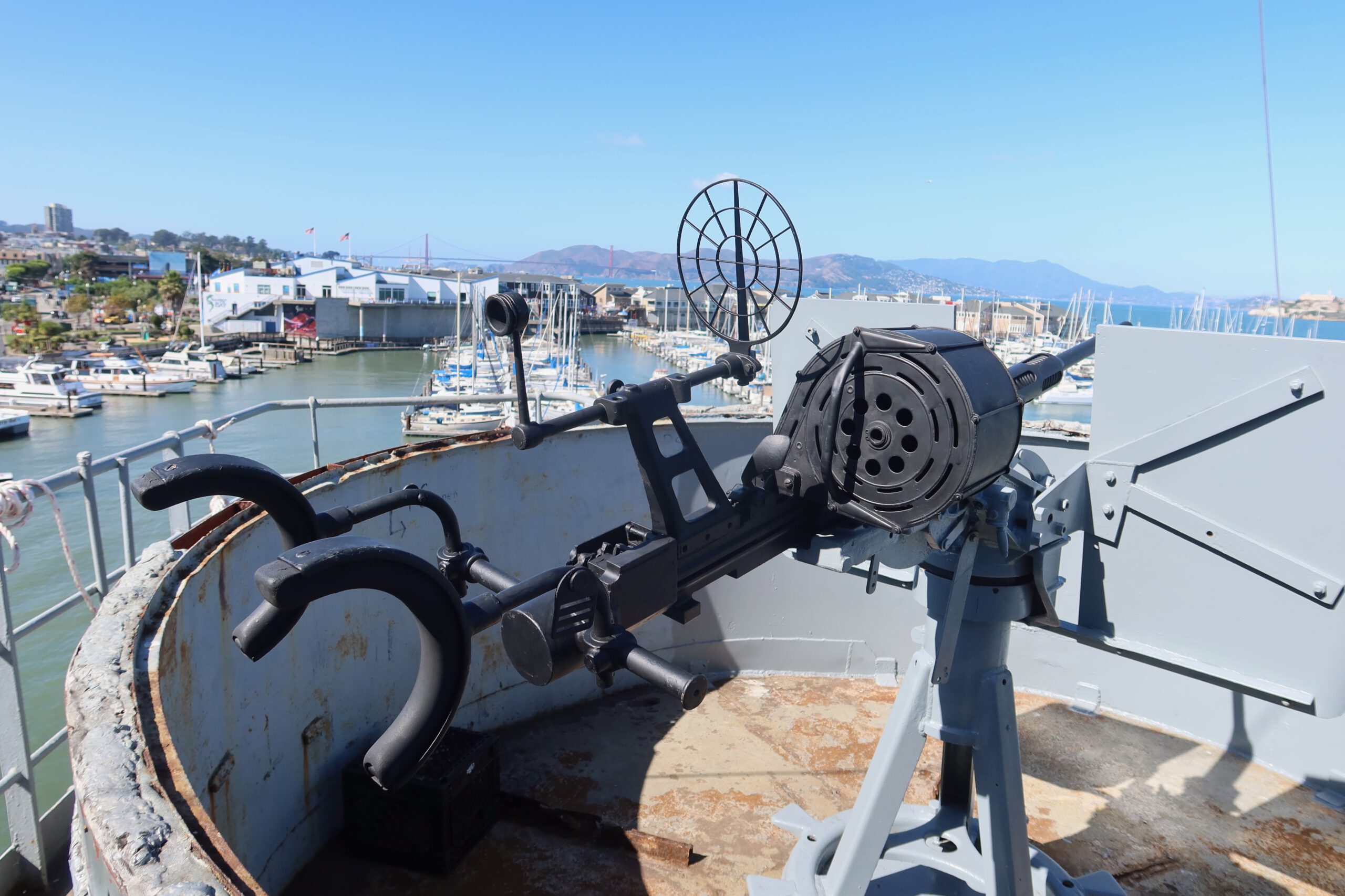 SS Jeremiah O'Brien deck gun position overlooking the San Francisco marina, showing original World War II anti aircraft weaponry on the Liberty ship