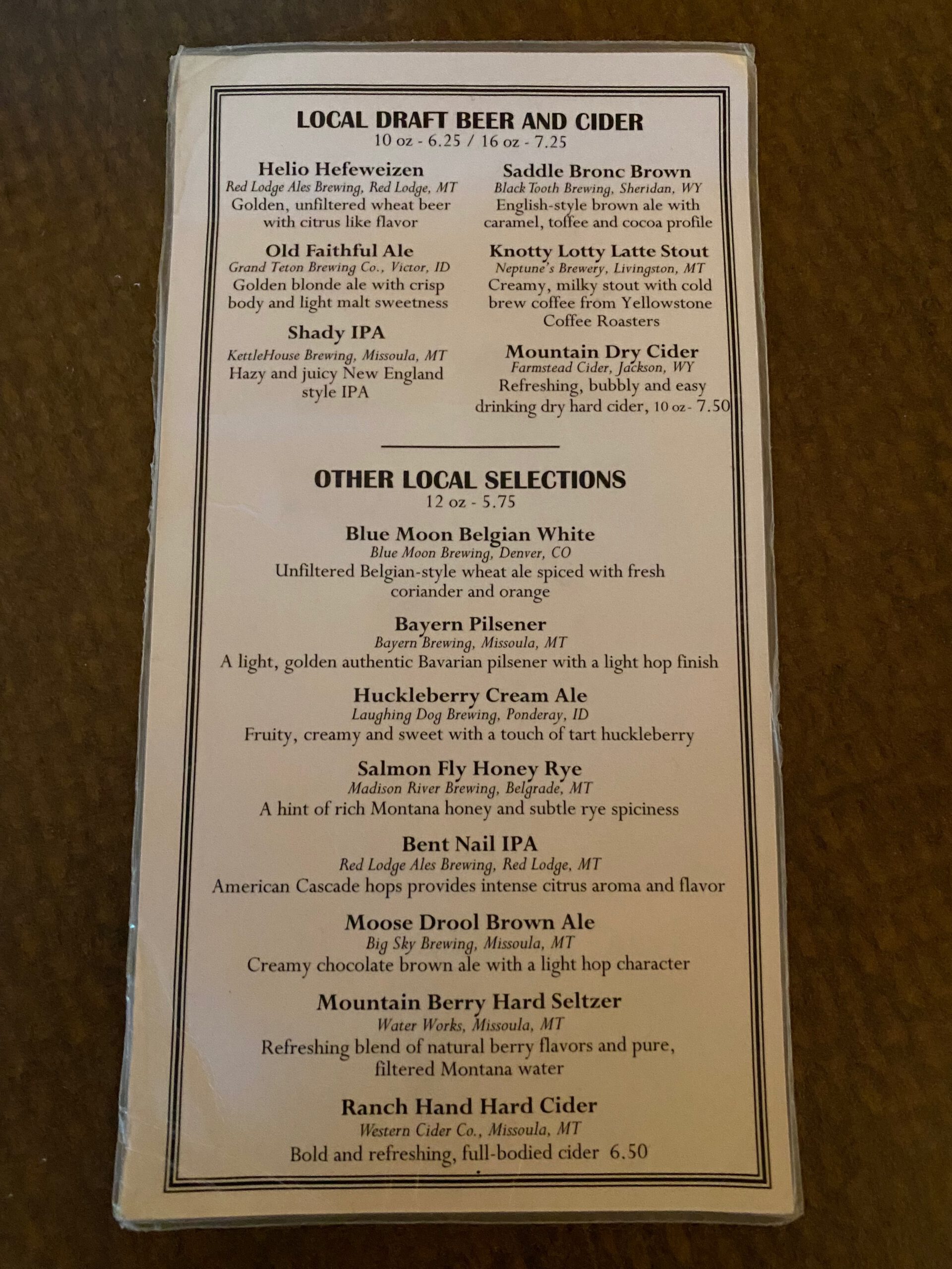Local draft beer and cider menu at Obsidian Dining Room Old Faithful Snow Lodge, including Knotty Lotty Latte Stout and Montana craft beers