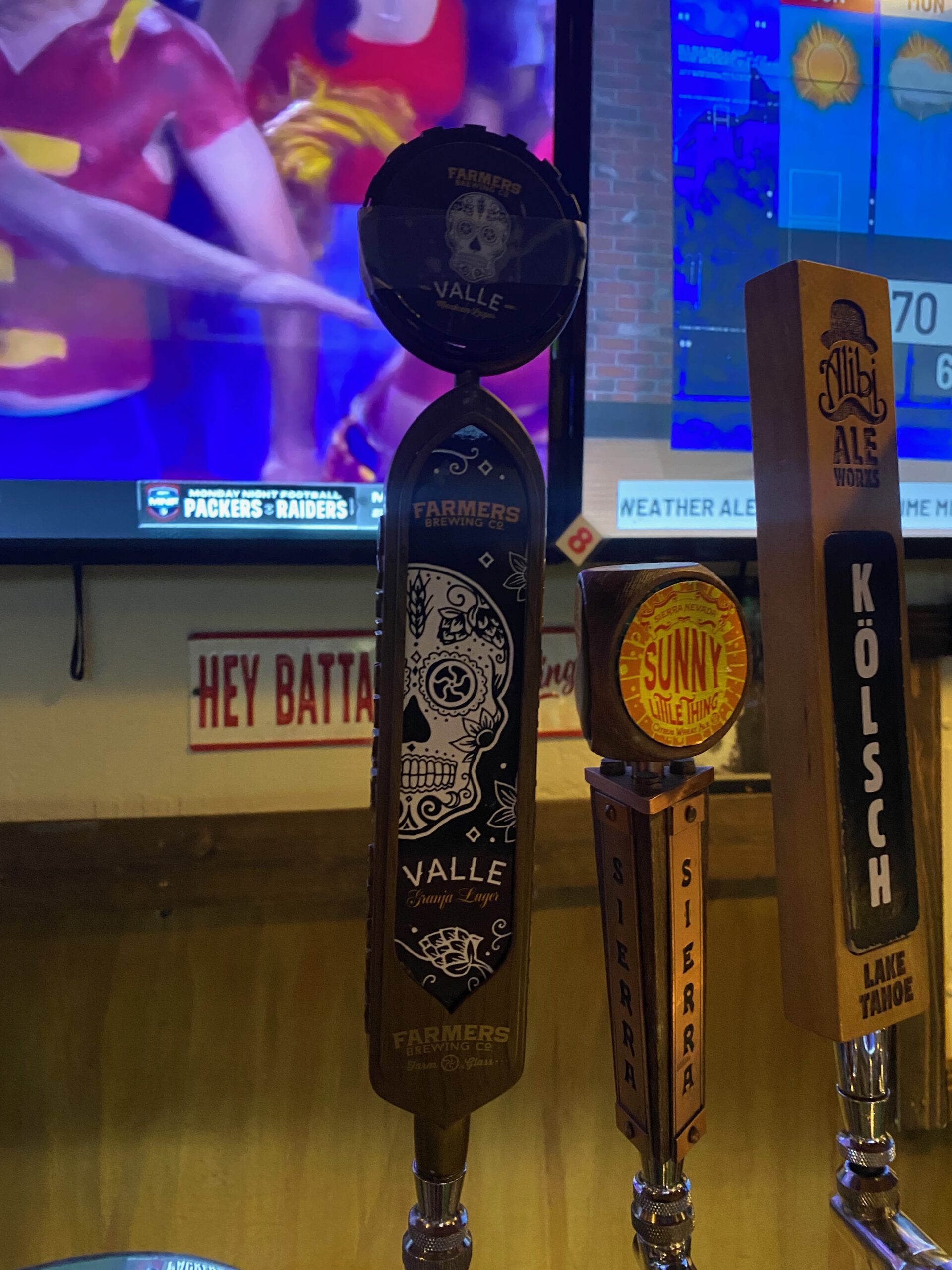 Going out in Lake Tahoe with local craft beer taps in Kings Beach, featuring Farmers Brewing Company Valle Lager and Sierra Nevada Sunny Little Thing on tap in a casual American bar
