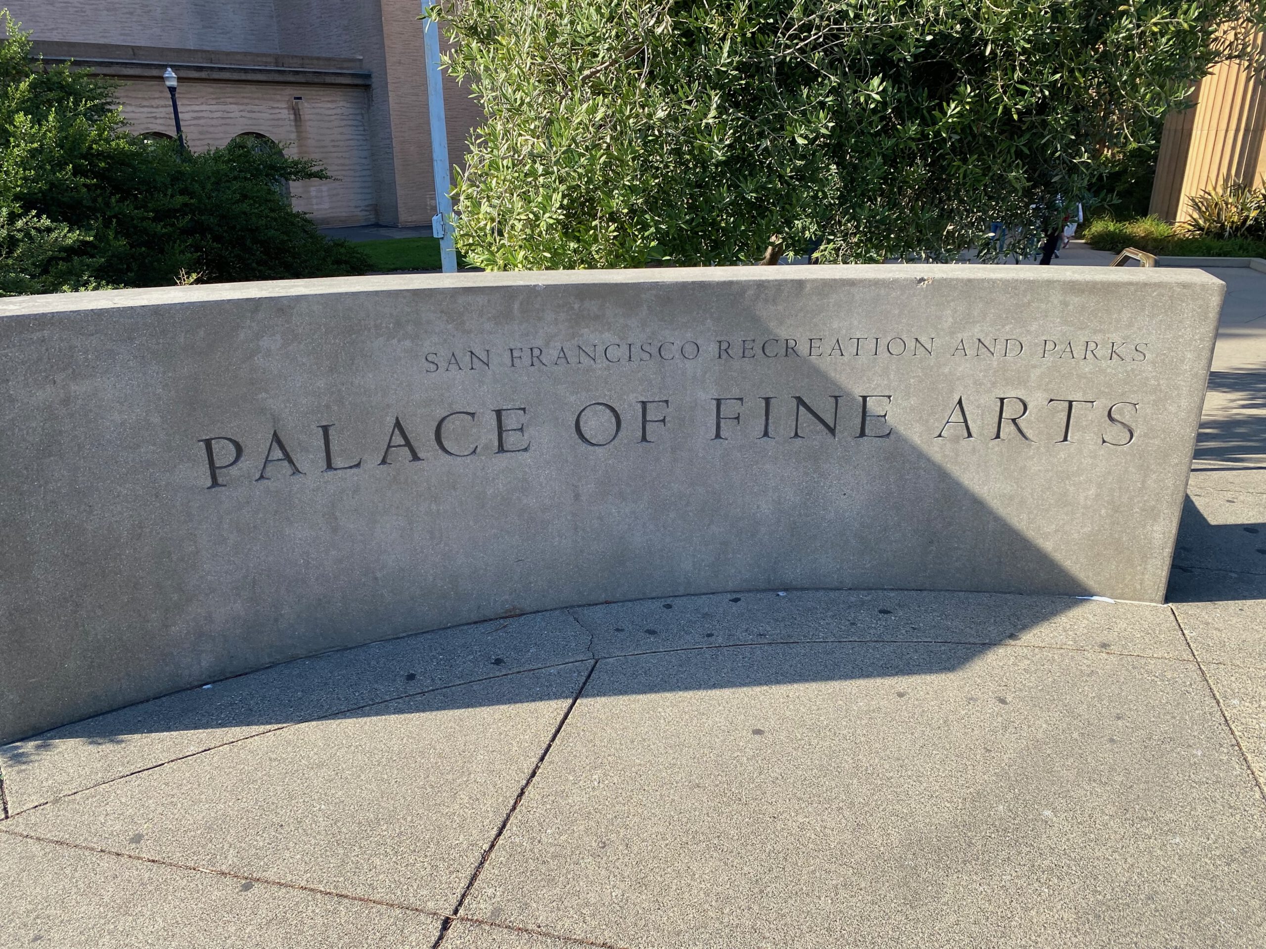 Palace of Fine Arts San Francisco entrance sign engraved in stone, marking the historic landmark managed by San Francisco Recreation and Parks in the Marina District