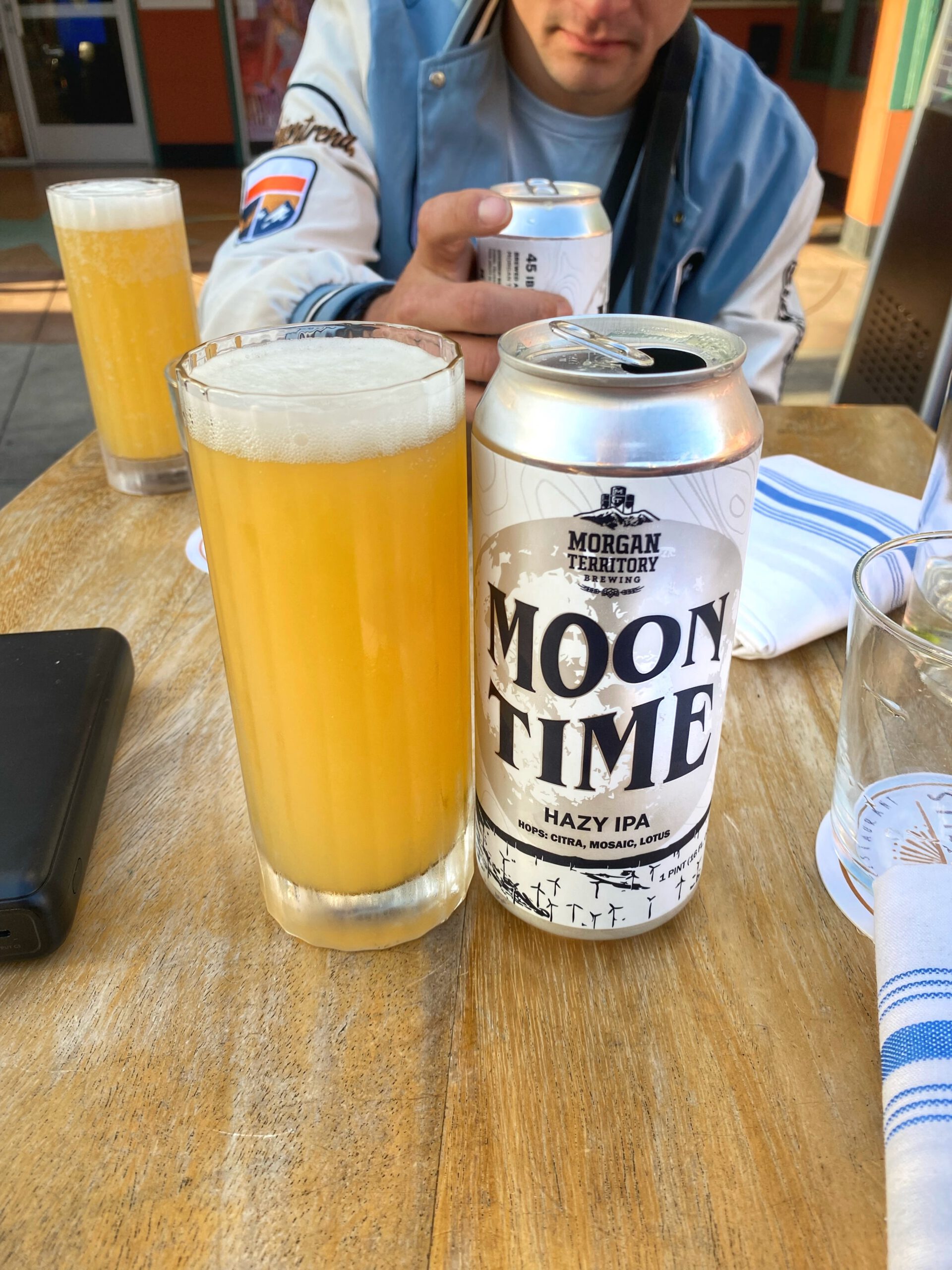 Hazy IPA beer served at Causwells San Francisco, Moon Time IPA by Morgan Territory Brewing with a full glass on an outdoor table