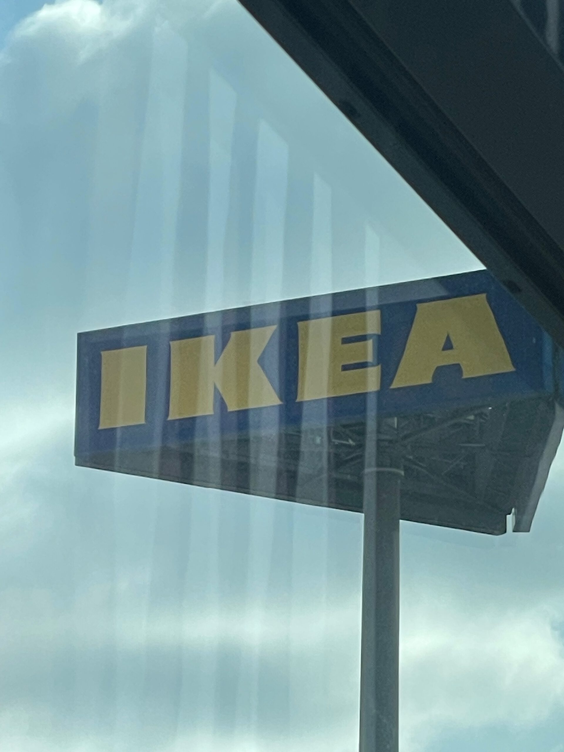IKEA Haparanda Restaurant and Store sign seen from the parking area, iconic IKEA logo at the northernmost IKEA in the world