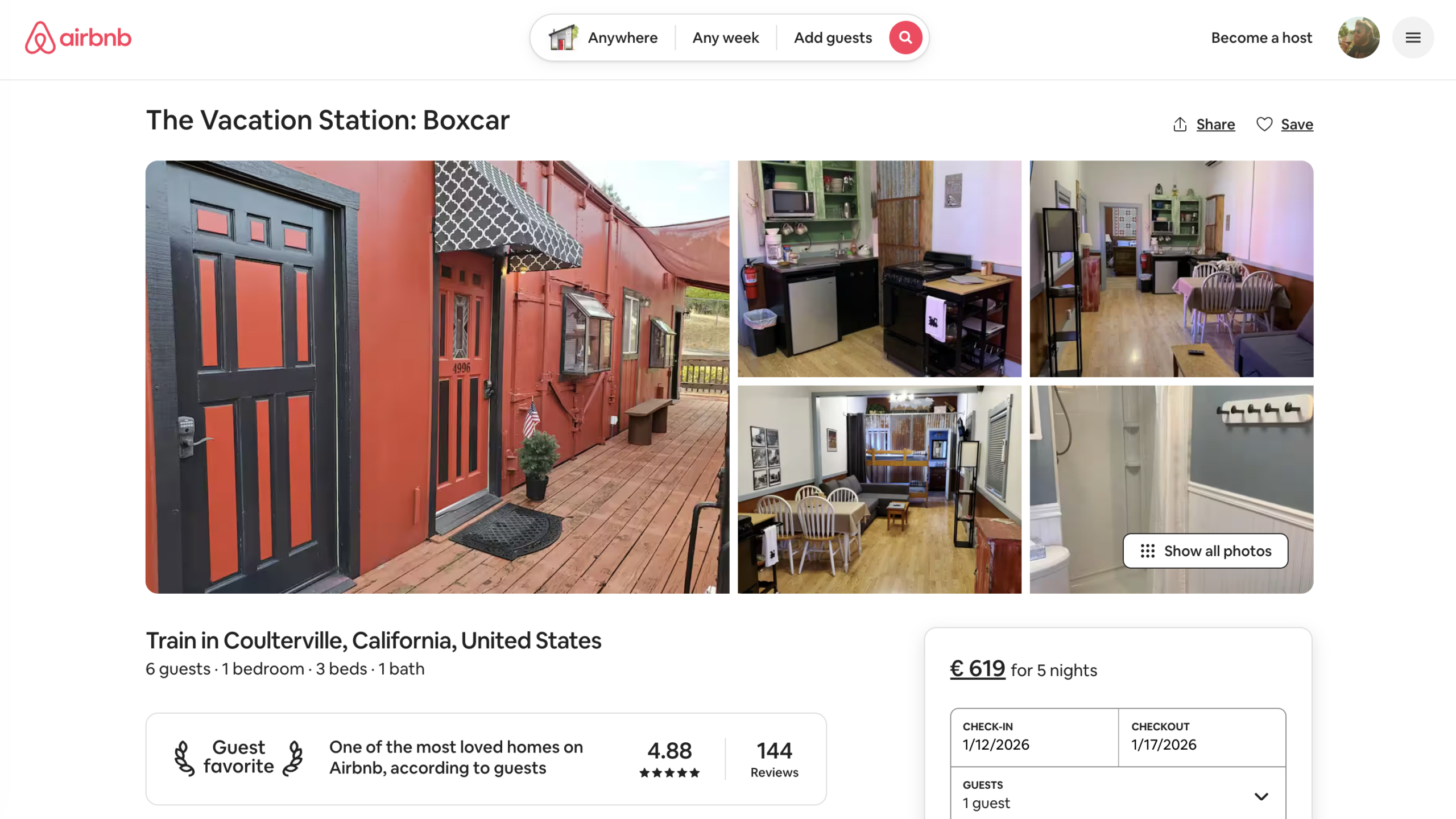 The Vacation Station Boxcar Airbnb in Coulterville California, converted red train car with private entrance, deck, kitchen and living space, unique stay near Yosemite National Park