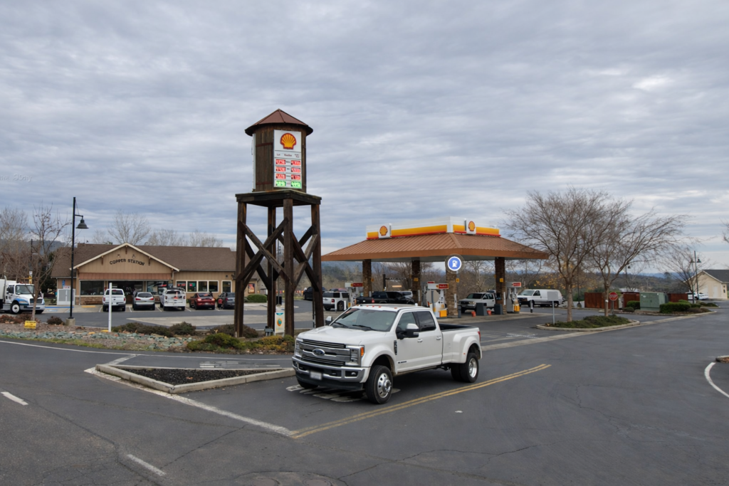Shell gas station in Copperopolis California with historic water tower, fuel pumps and classic Copper Valley roadside setting near Coulterville