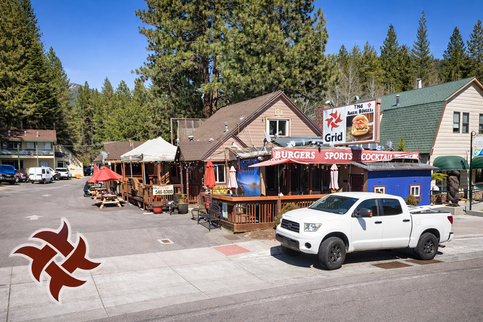 The Grid Bar and Grill Lake Tahoe in Kings Beach with outdoor patio, pine trees and local bar atmosphere