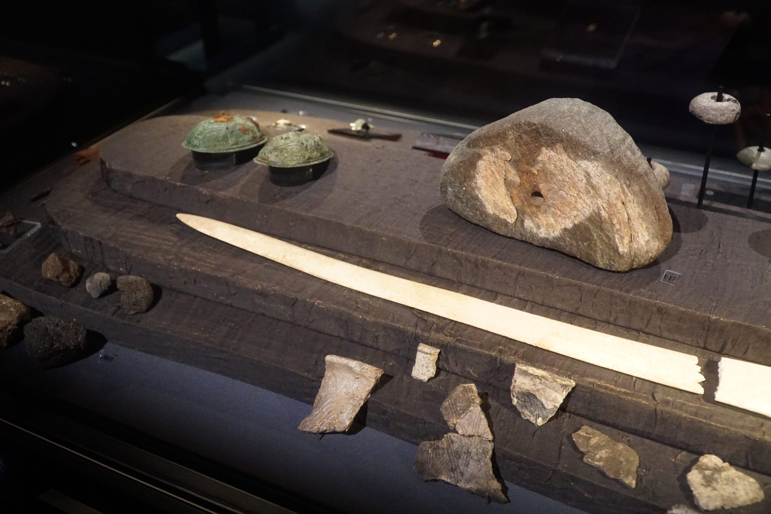 Lofotr Viking Museum archaeological exhibition showing Viking tools, bone artifacts and stone objects found at Borg on Vestvågøy, Lofoten Islands