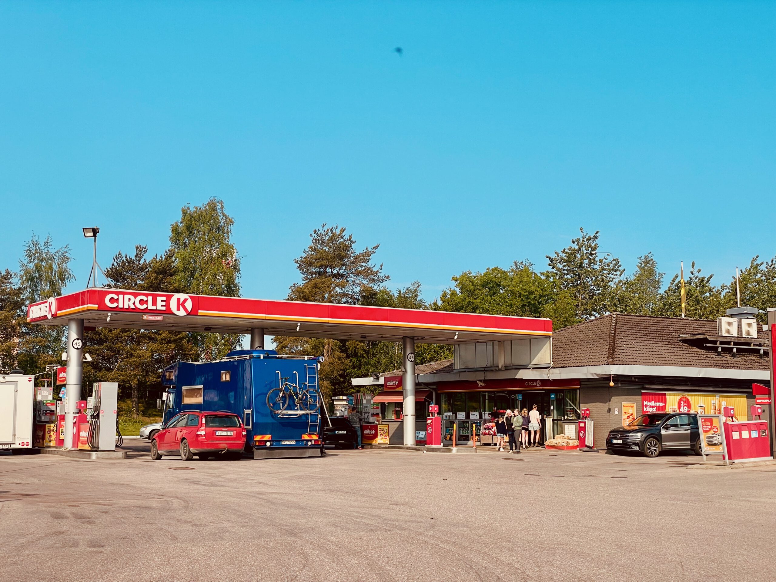 Circle K Enköping Salatullen gas station exterior in Sweden, 24,7 open road trip stop with fuel pumps, shop and fast food options