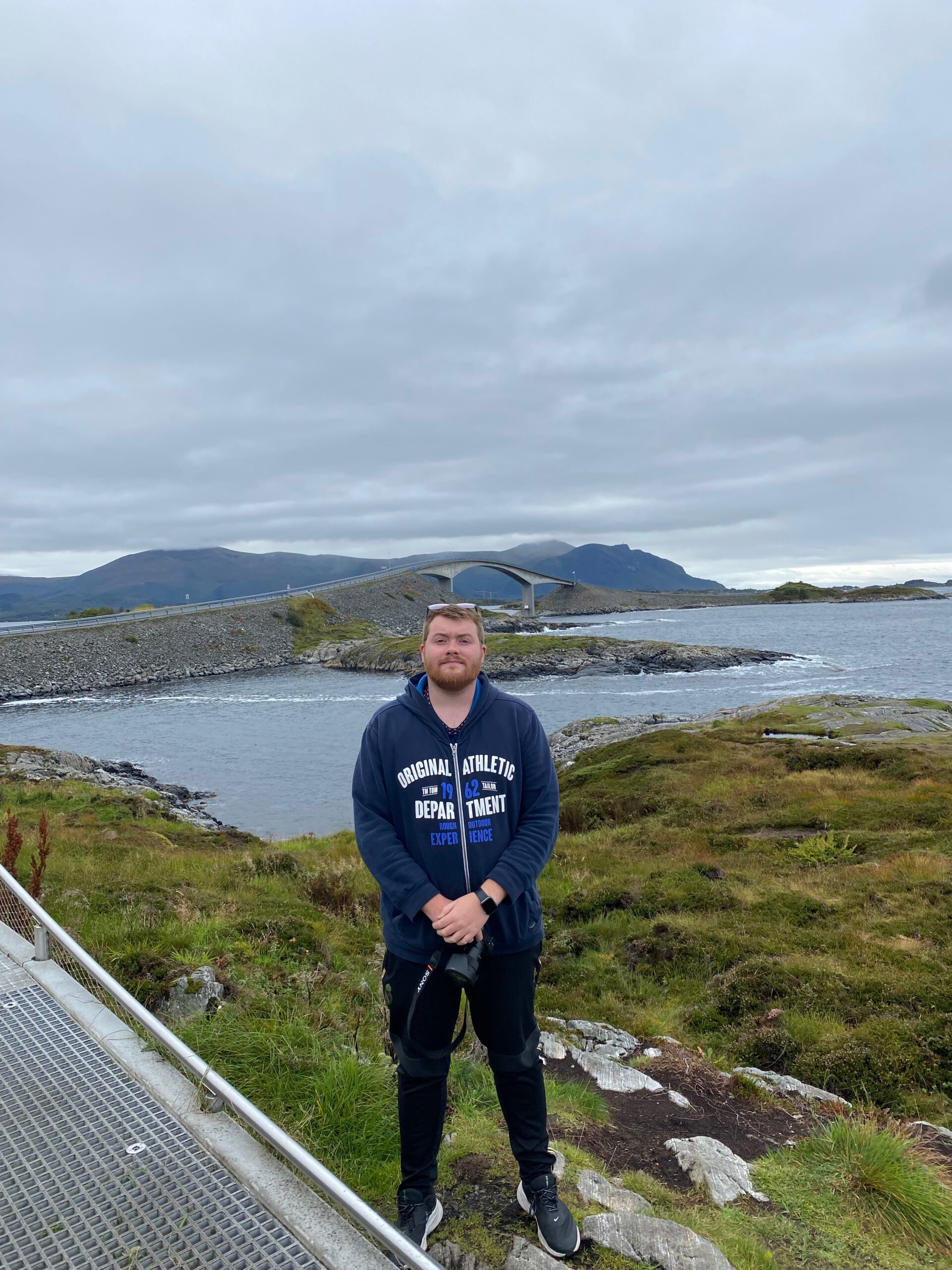 Timo van den Berg Timeuw standing at Atlantic Ocean Road Norway viewpoint near Storseisundet Bridge