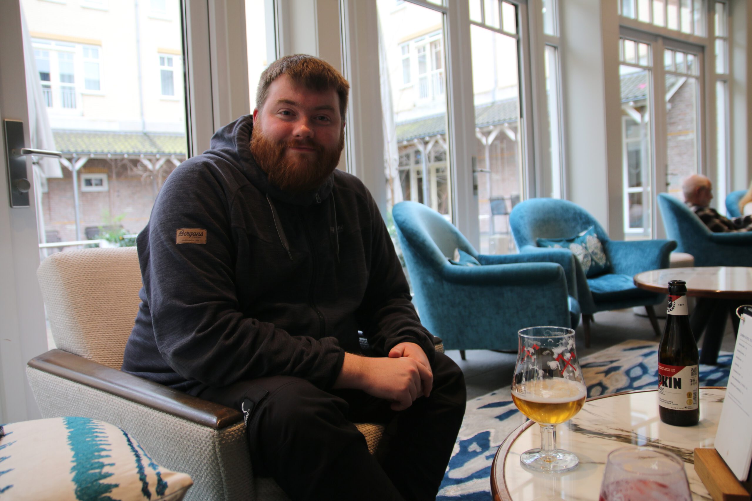 Grand Hotel Ter Duin review Timo van den Berg Timeuw enjoying a beer in the hotel lobby lounge area in Burgh Haamstede during a Valentine weekend stay