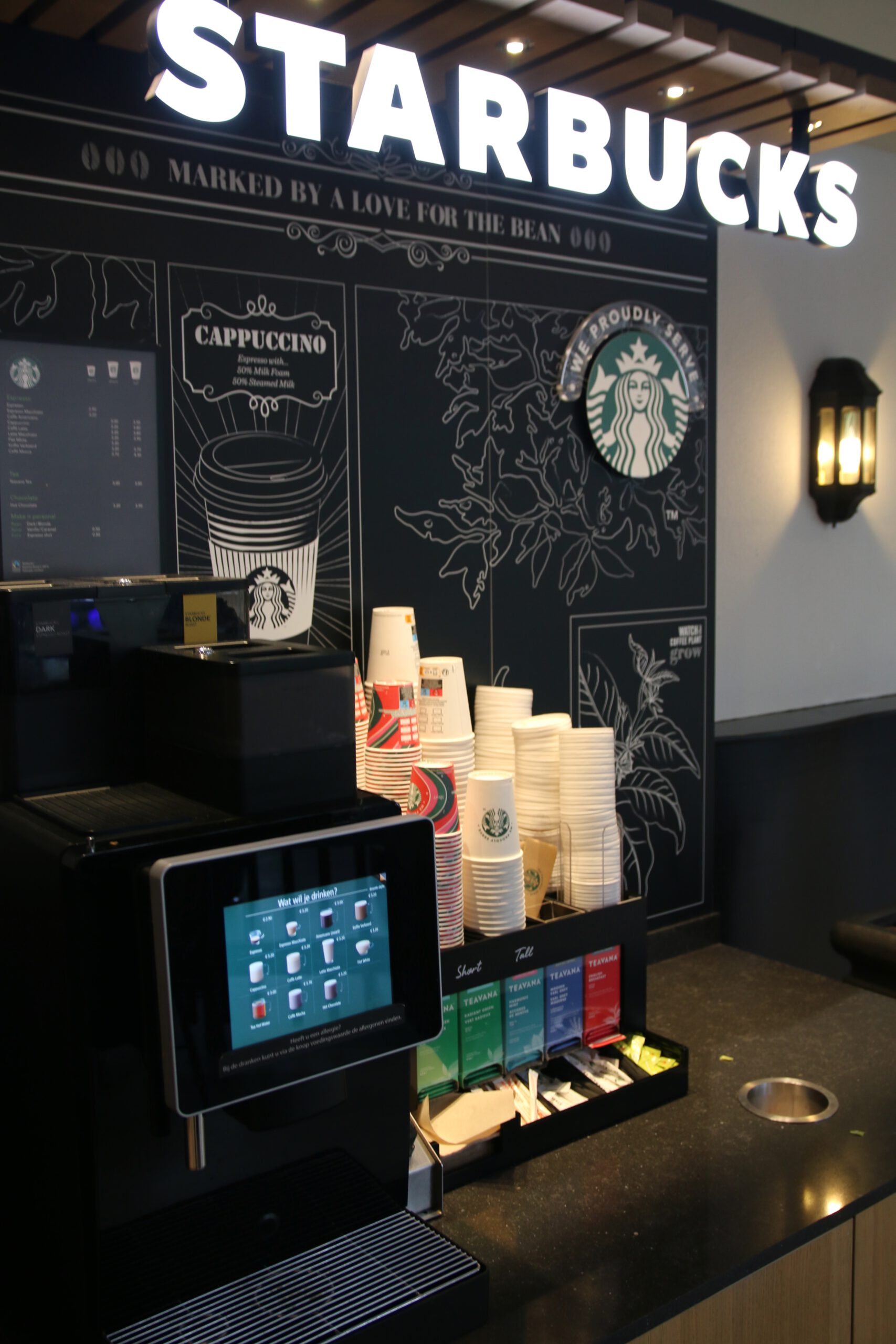Landal Noordzee Résidence De Banjaard Starbucks To Go coffee machine in the Plaza in Kamperland, Zeeland, self service coffee and tea options with multiple cup sizes