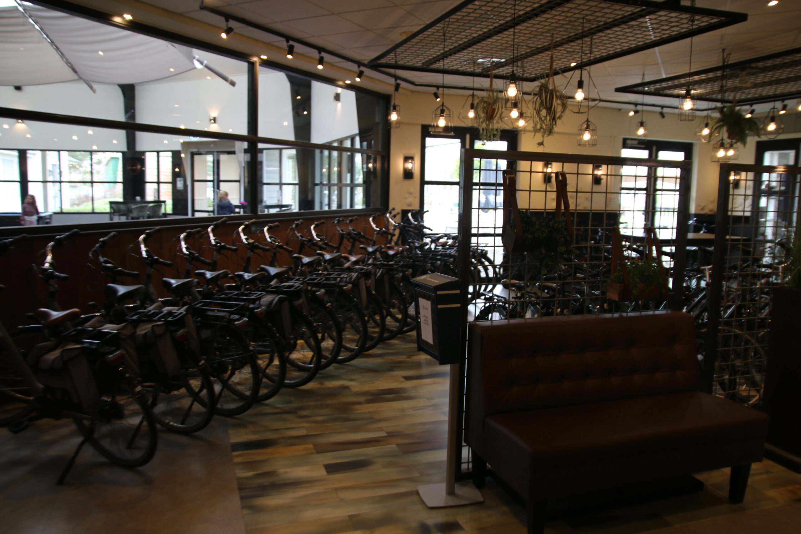 Landal Noordzee Résidence De Banjaard bike rental inside the Plaza in Kamperland, Zeeland, modern indoor bicycle hire area for guests near Banjaard Beach