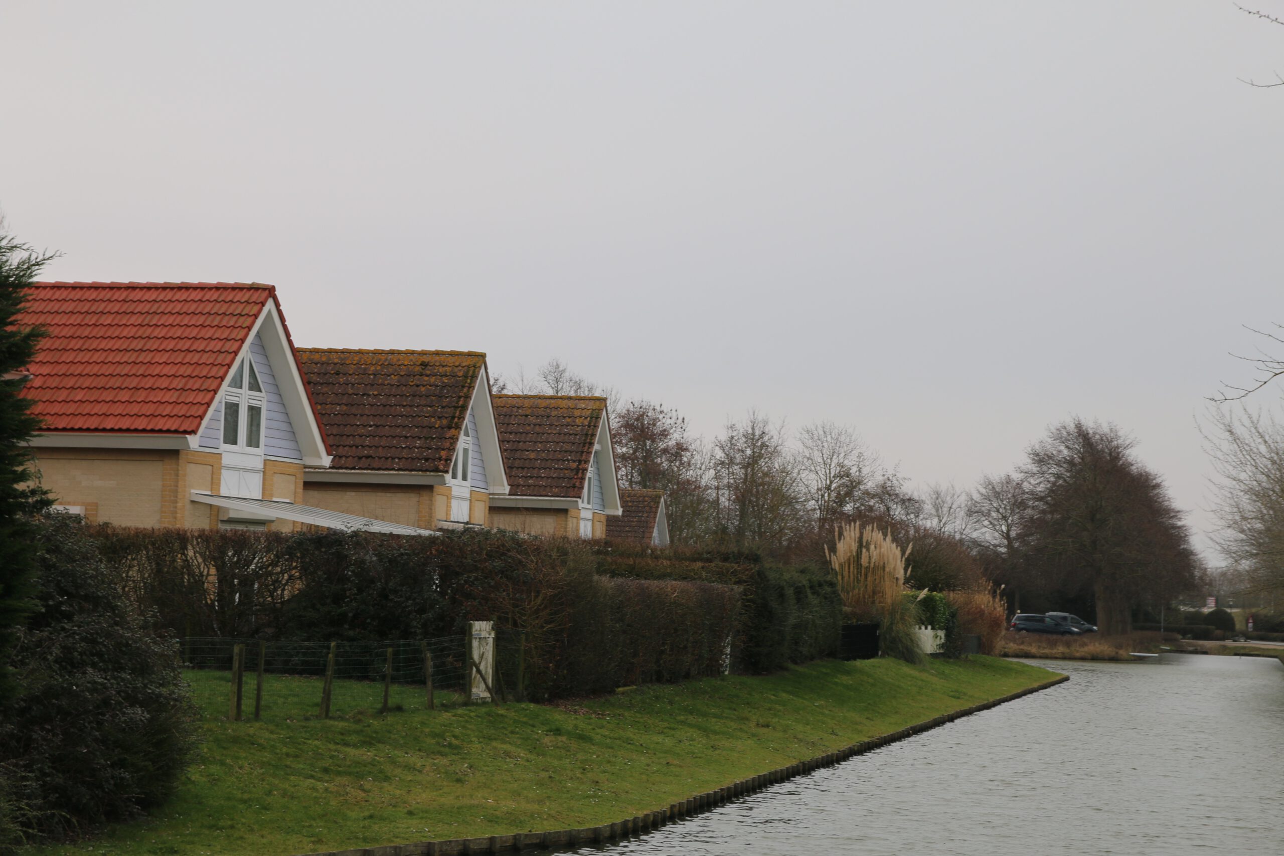 Landal Noordzee Résidence De Banjaard waterfront holiday homes in Kamperland, Zeeland, traditional Dutch style villas along a quiet canal