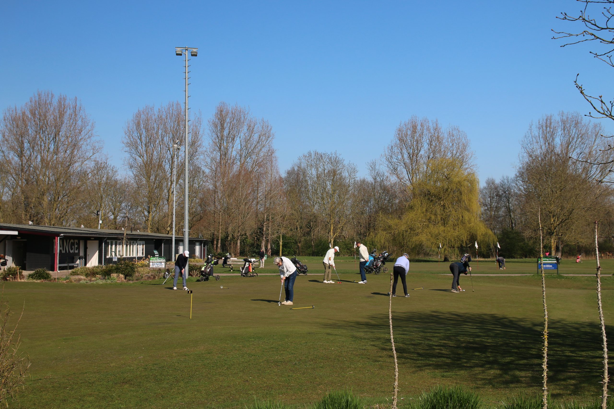 Golfclub Zeegersloot golfers practicing on the putting green in Alphen aan den Rijn
