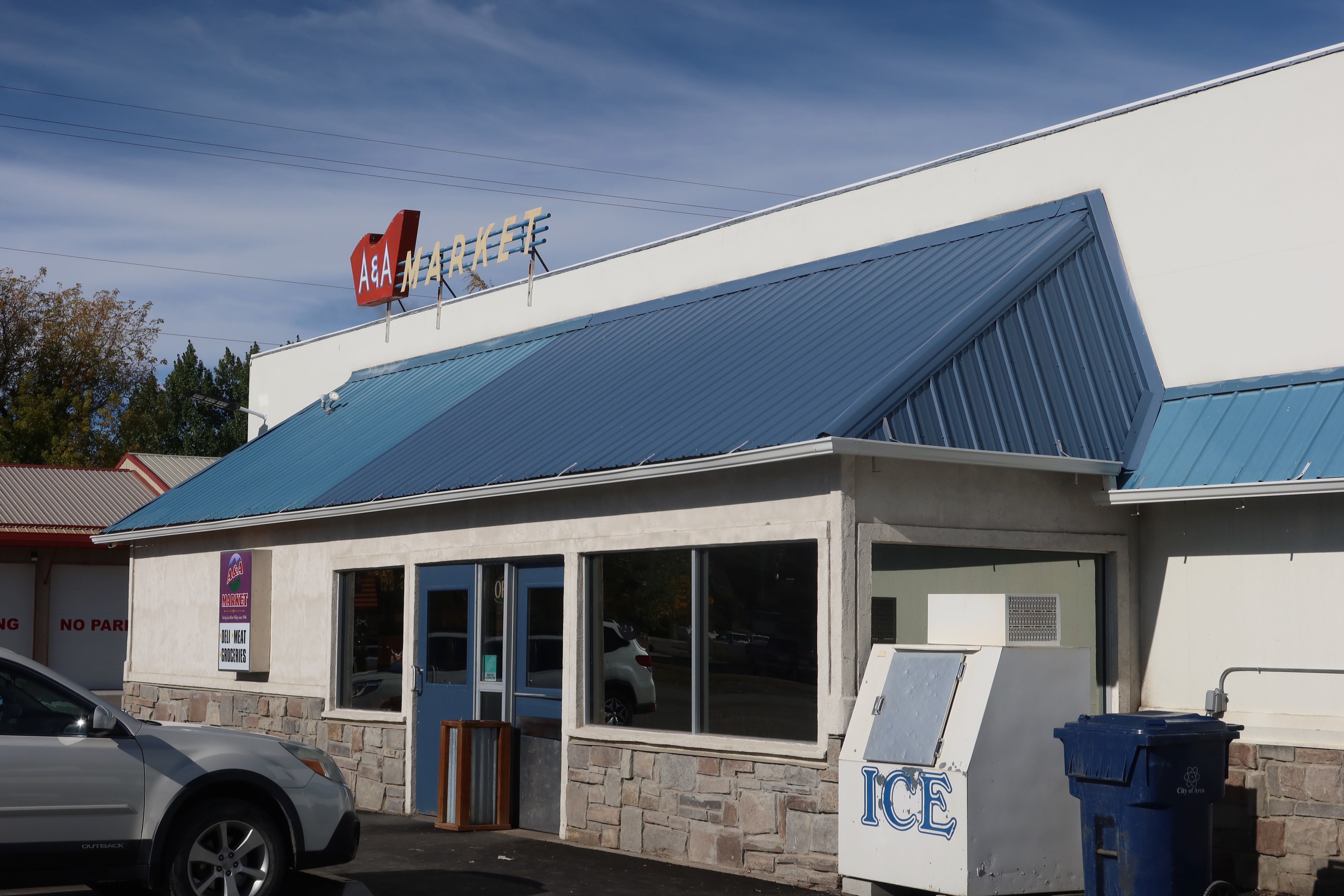 A&A Market in Arco, Idaho, a local example of reliable stores in America with parking, ice box, and classic roadside storefront