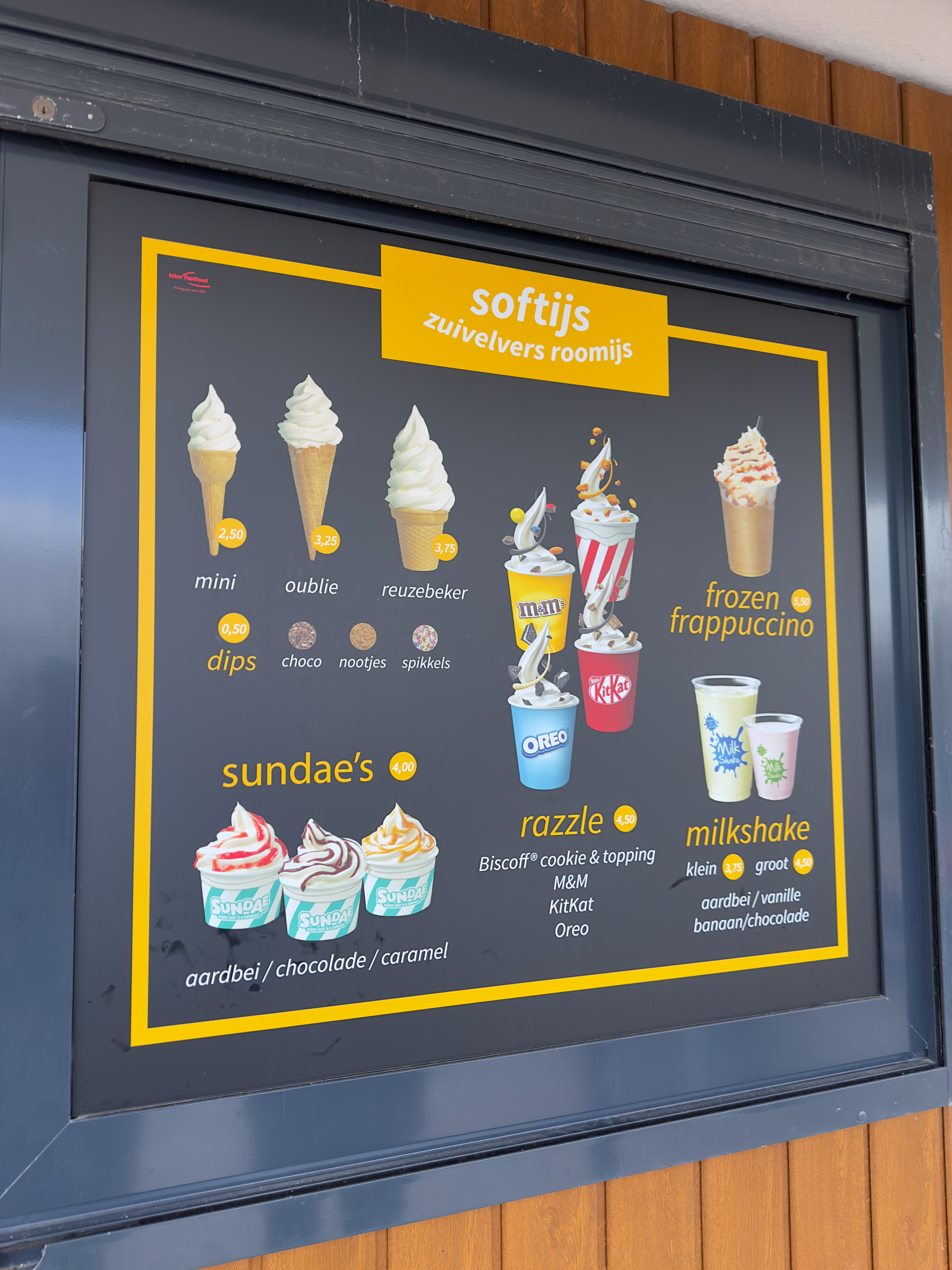 Ice cream menu at Frituur Noordzee Kamperland with soft serve, sundaes, razzle, and milkshakes