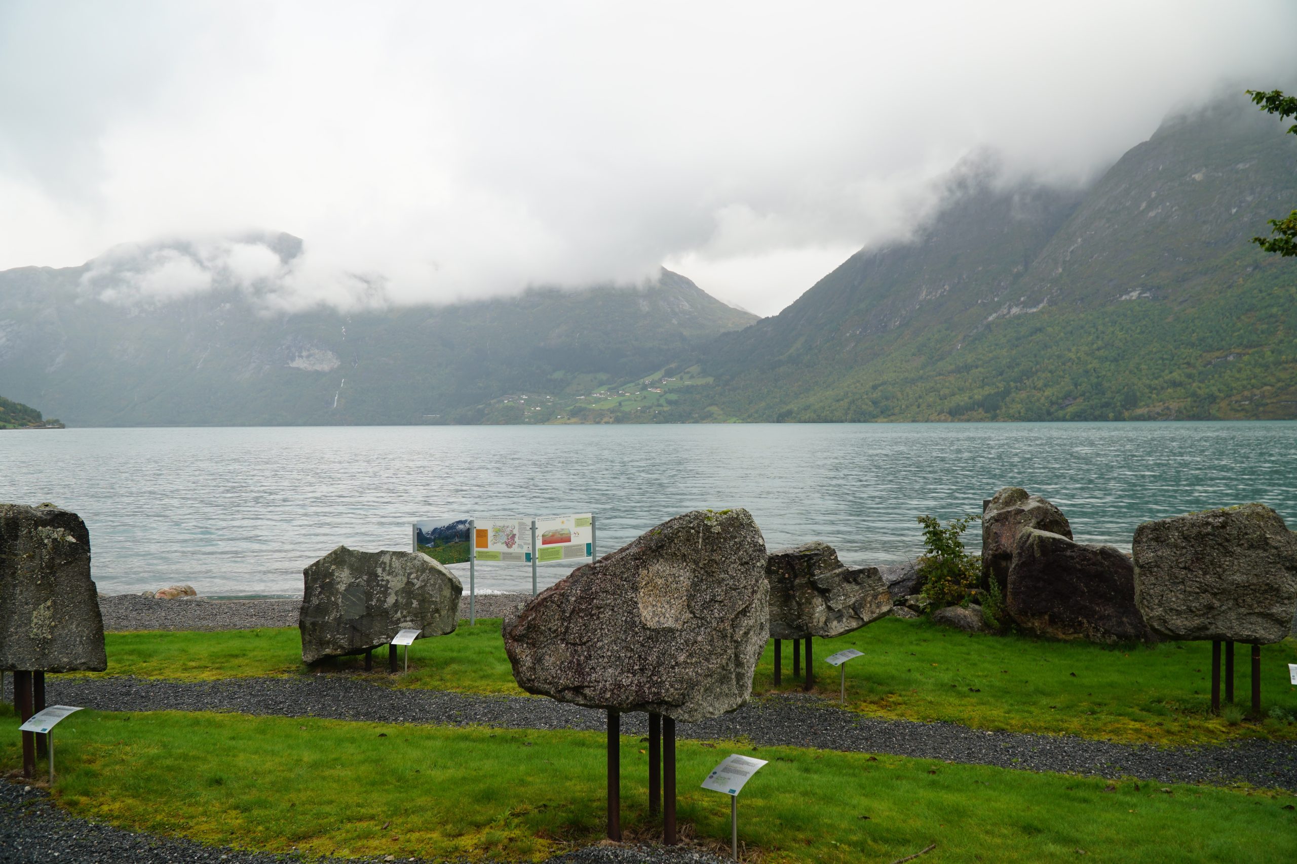 Jostedalsbreen National Park Center geological garden with large rock displays beside Oppstrynsvatnet in Norway